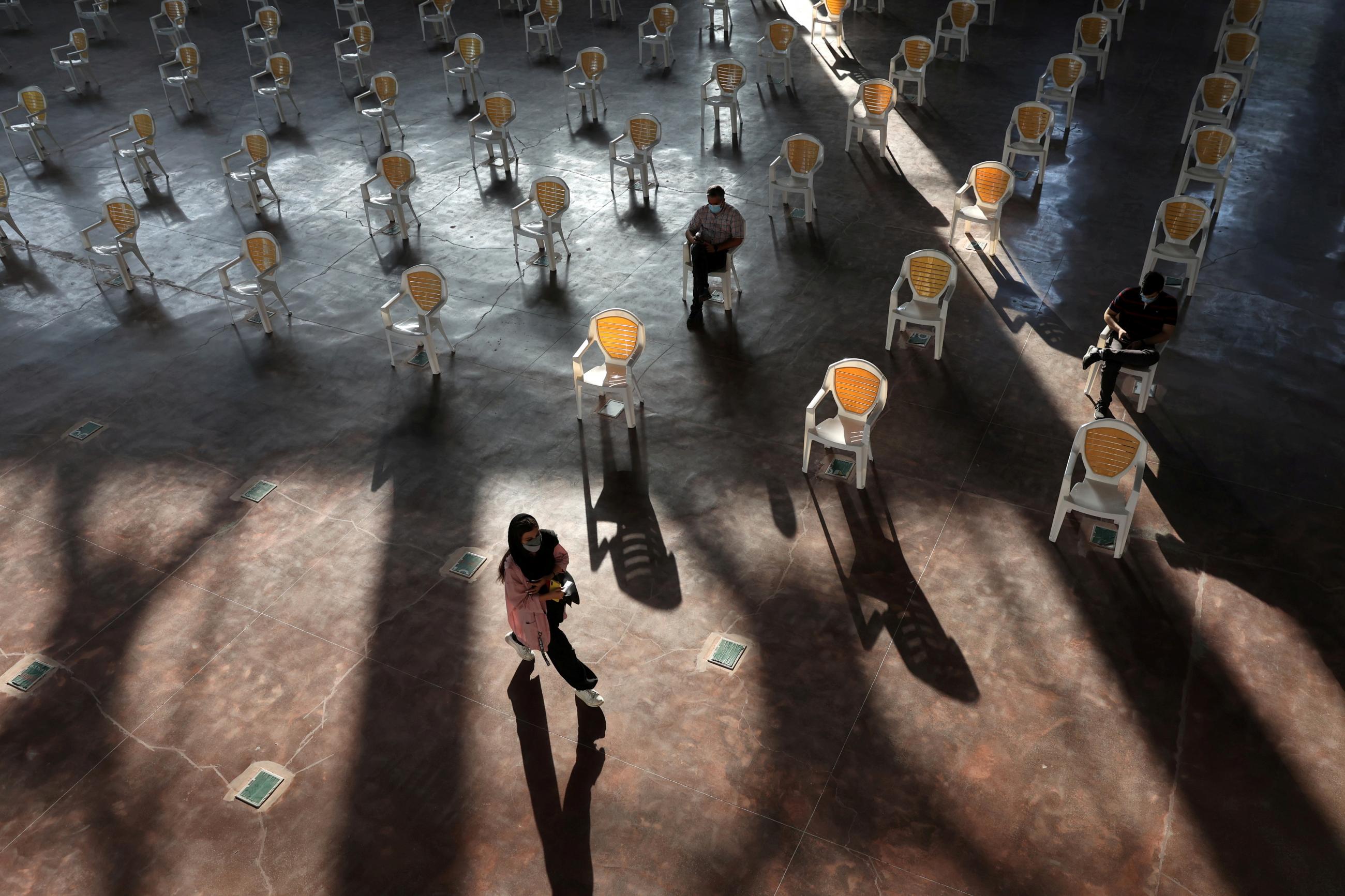 A woman enters a vaccination center in Tehran, Iran, on September 20, 2021