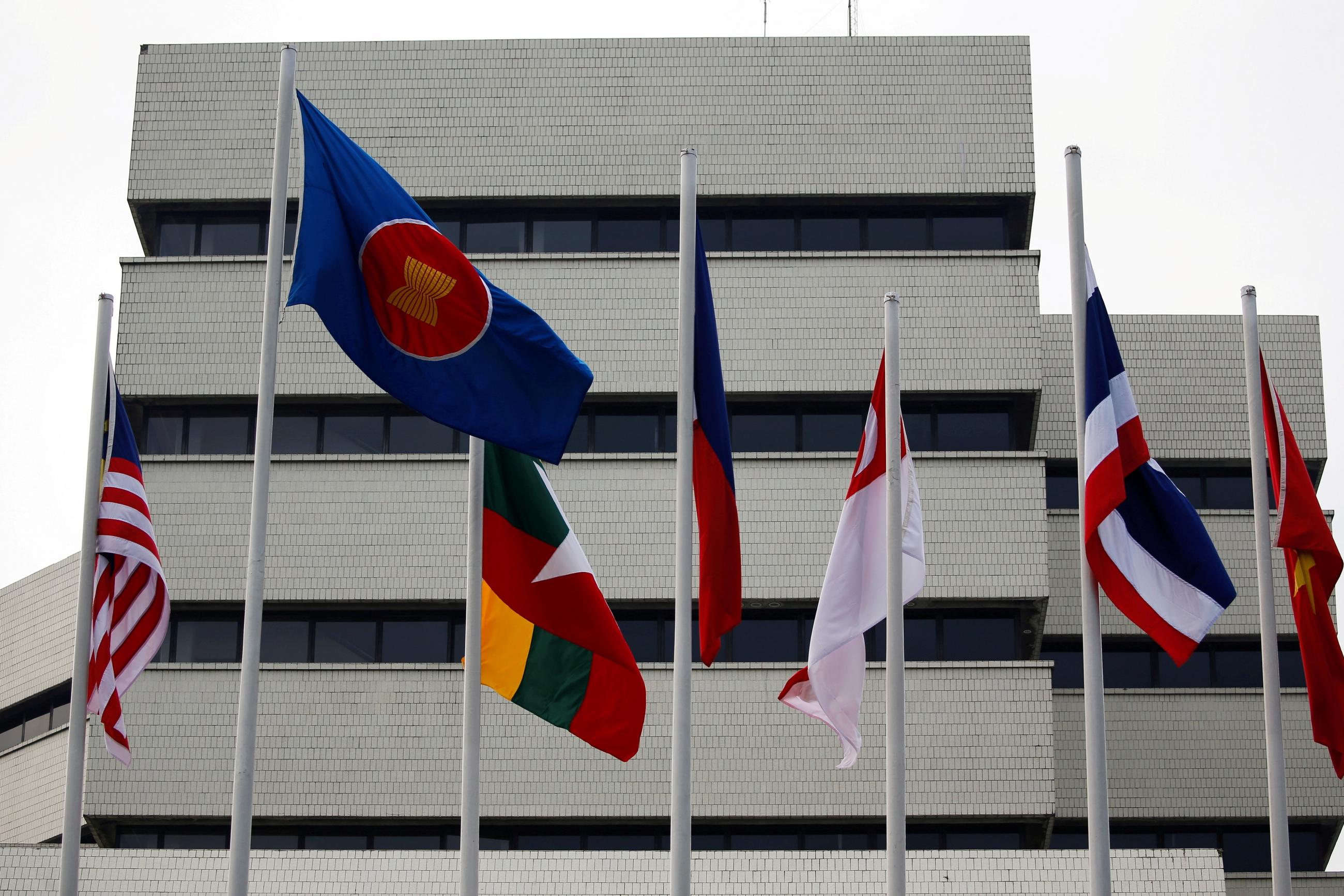 Flags are seen outside the Association of Southeast Asian Nations (ASEAN) secretariat building before an ASEAN leaders' meeting in Jakarta, Indonesia, April 23, 2021.