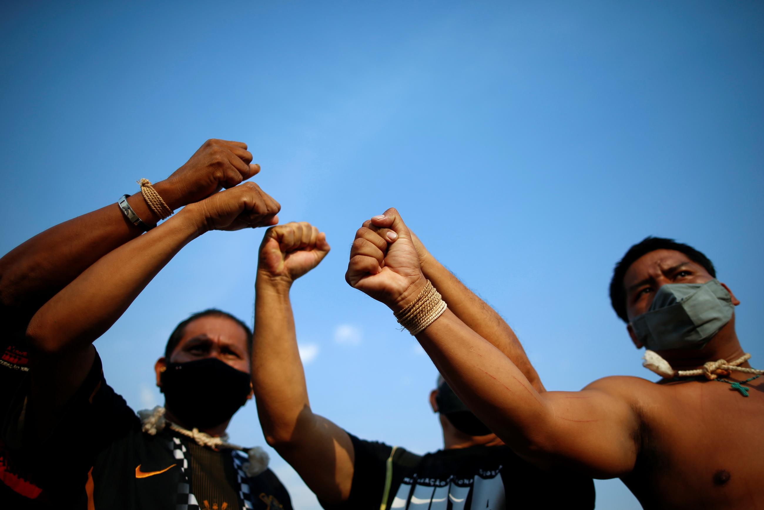 Indigenous people take part in a protest on the day of Brazil's Supreme Court trial of a landmark case on indigenous land rights in Brasilia, Brazil, on September 15, 2021. 