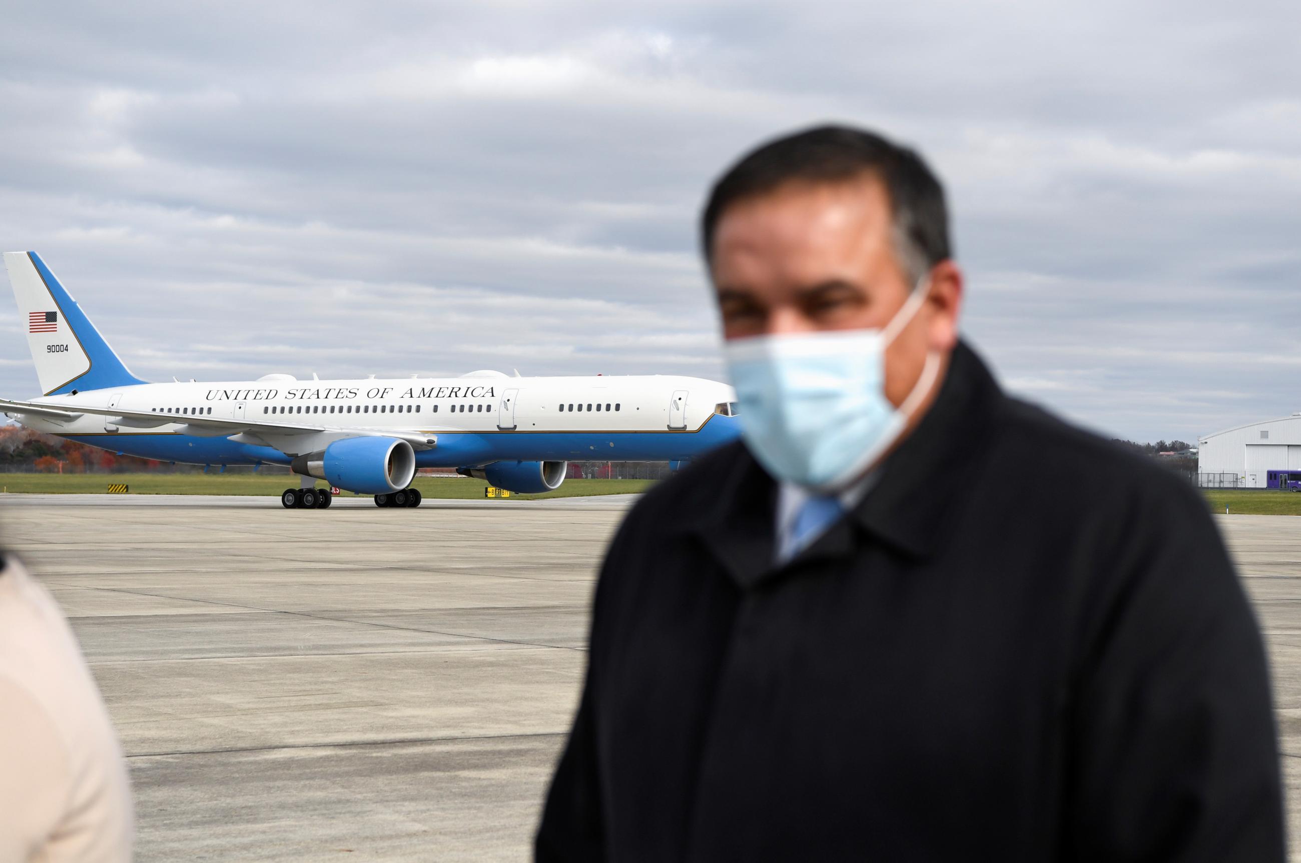 Columbus Mayor Andrew Ginther waits to welcome U.S. Vice President Kamala Harris as she arrives aboard Air Force Two at John Glenn Columbus International Airport, in Columbus, Ohio.