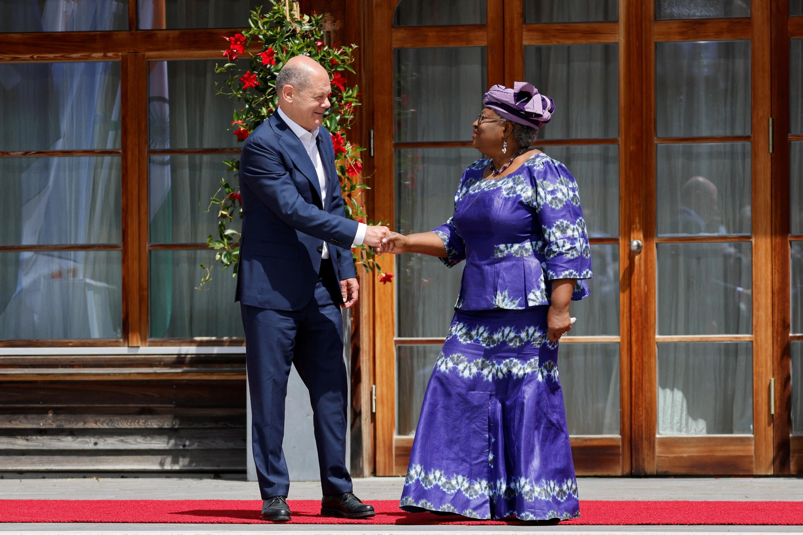 German Chancellor Olaf Scholz welcomes WTO Director-General Ngozi Okonjo-Iweala, at the G7 leaders' summit at Schloss Elmau, in Germany, on June 27, 2022. 