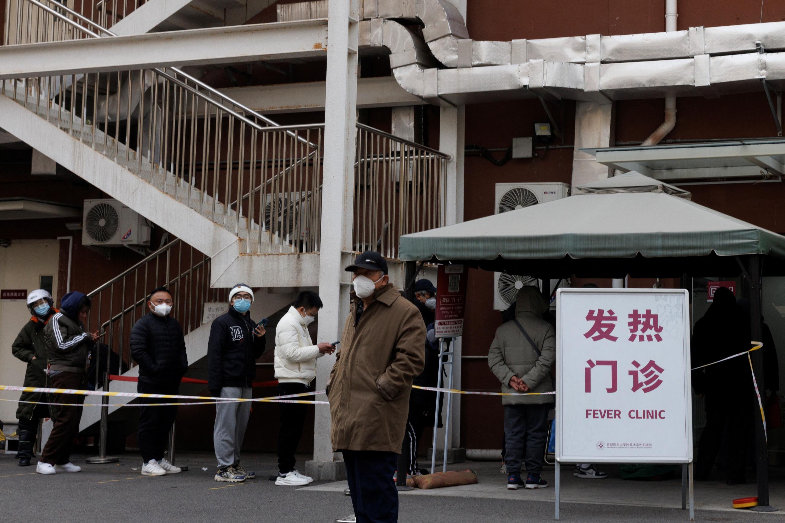 People line up at the fever clinic of a hospital as coronavirus disease (COVID-19) outbreaks continue in Beijing, China, on December 9, 2022.