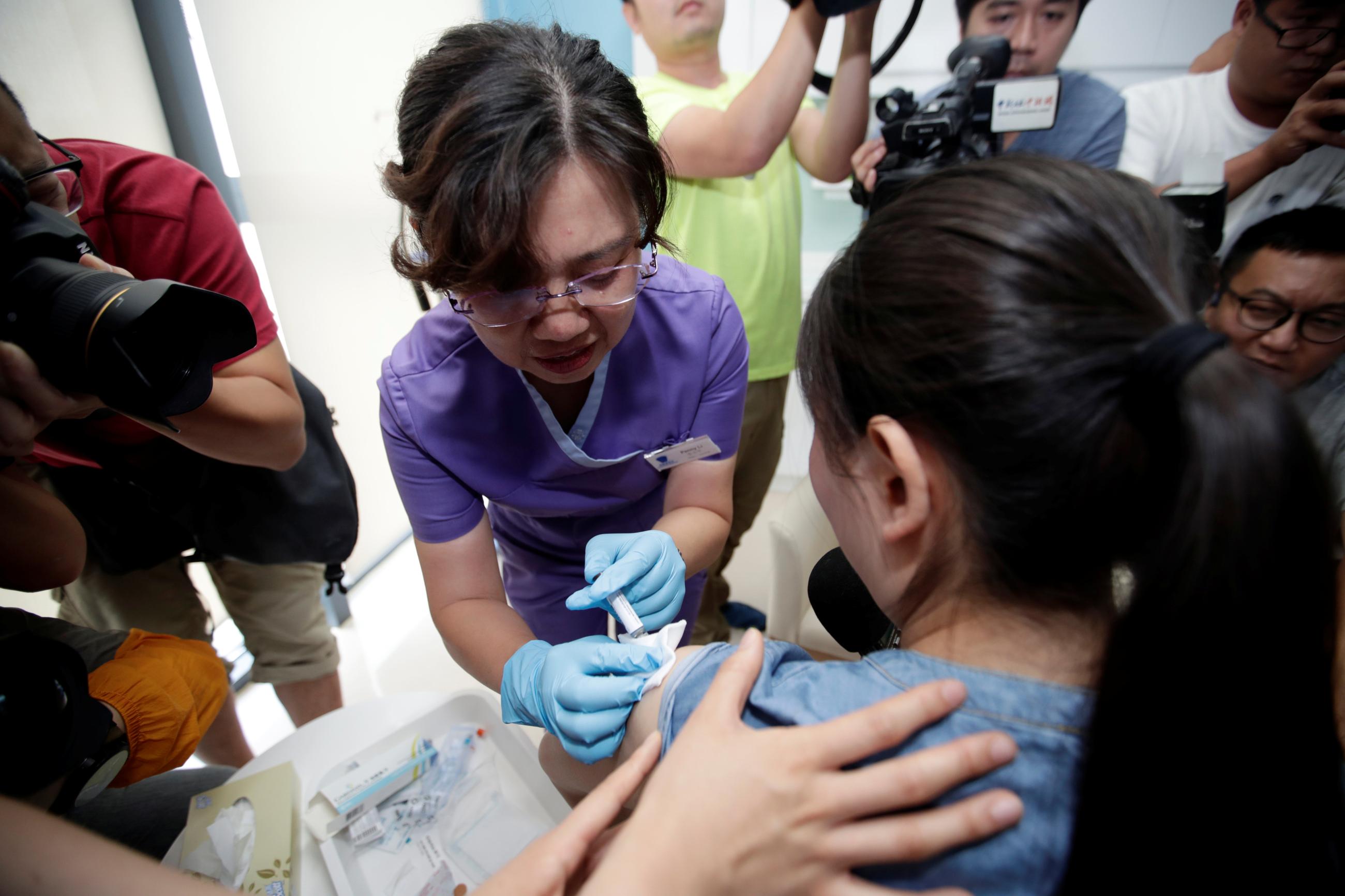 A woman from Beijing receives an injection of the Gardasil 9 human papillomavirus (HPV) vaccine, which, according to local media, is the first in mainland China, at a hospital in Boao, Hainan province, China May 30, 2018.