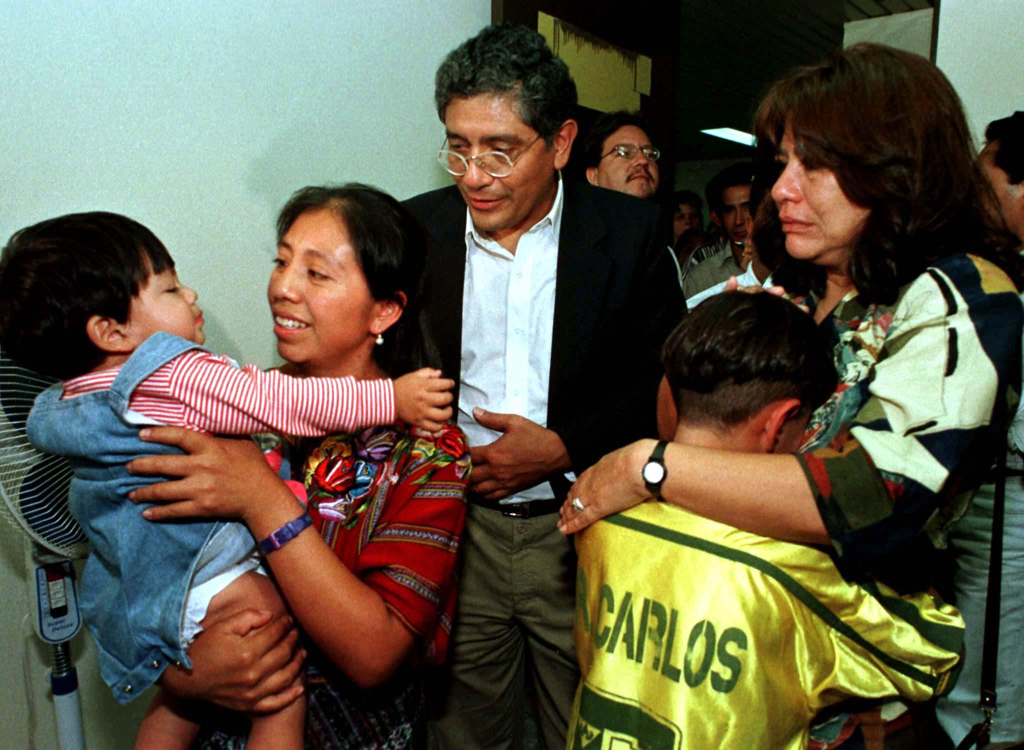 Elivia Ramirez holds her son, Pablito, after recovering him from a foster home in a landmark case, in Guatemala, on August 16, 1998. Elivia says that she was tricked into giving her son for adoption.