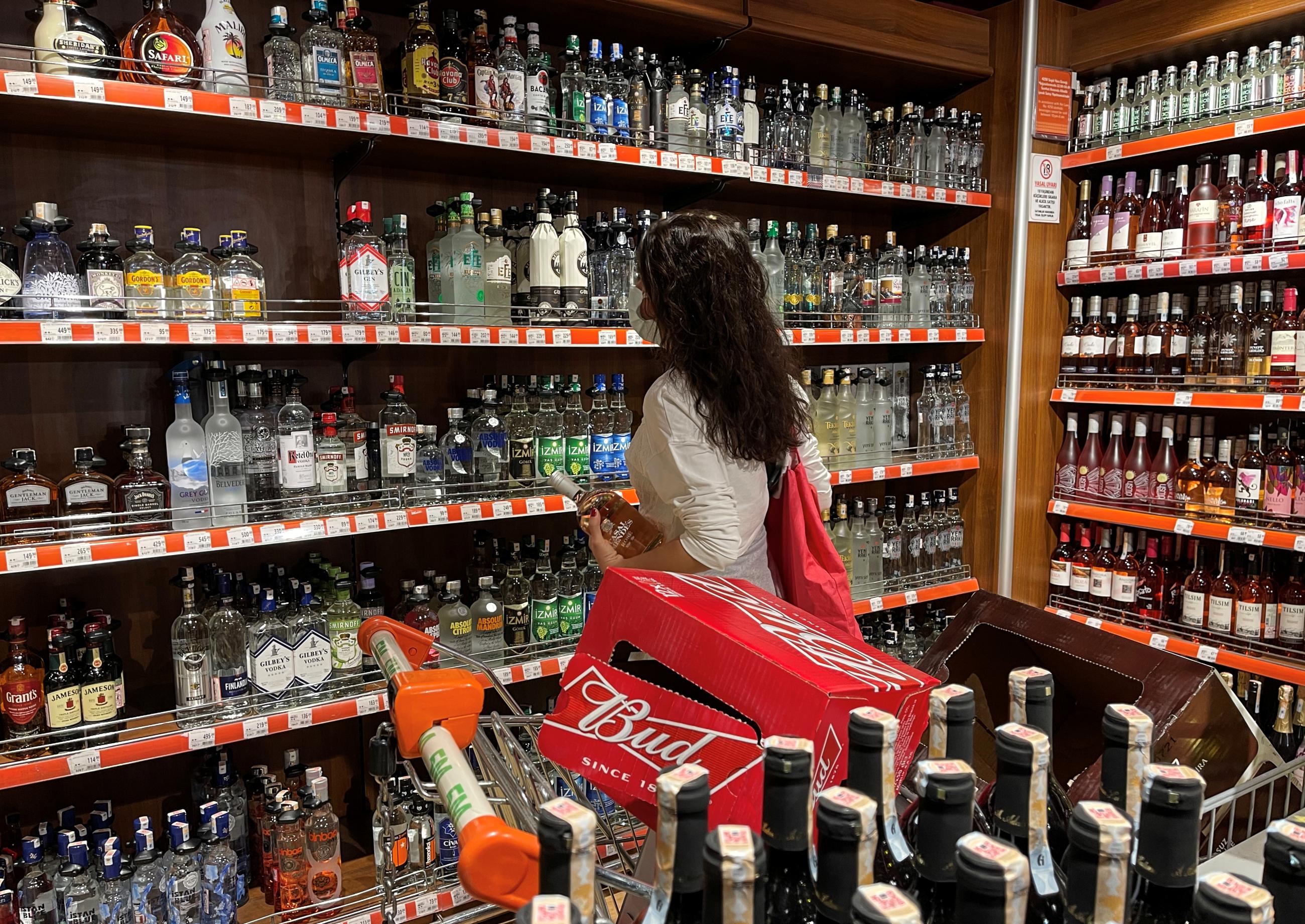 A customer shops for alcoholic beverages at a supermarket ahead of a nationwide "full closure" amid the spread of the coronavirus disease (COVID-19), in Istanbul, Turkey, on April 28, 2021. 
