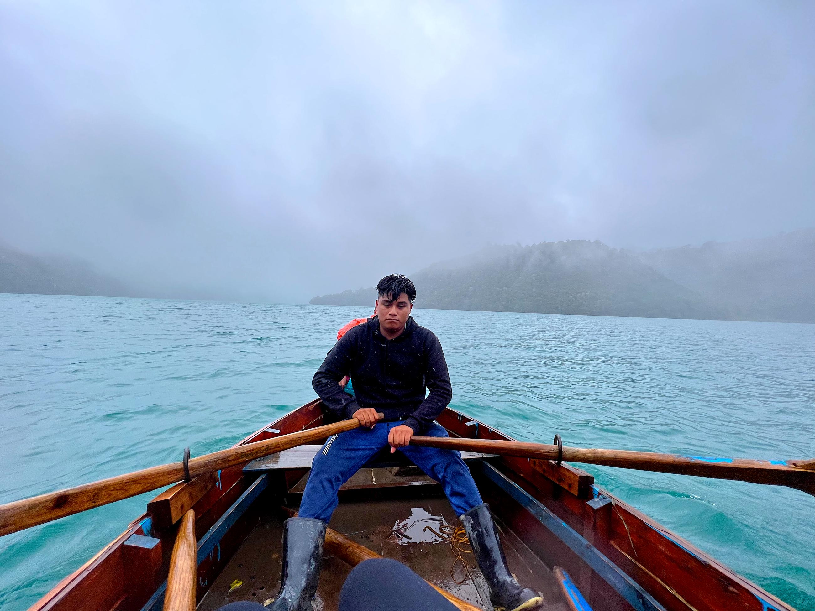 A local guide rows a motorless boat, in in Laguna Brava, Guatemala.