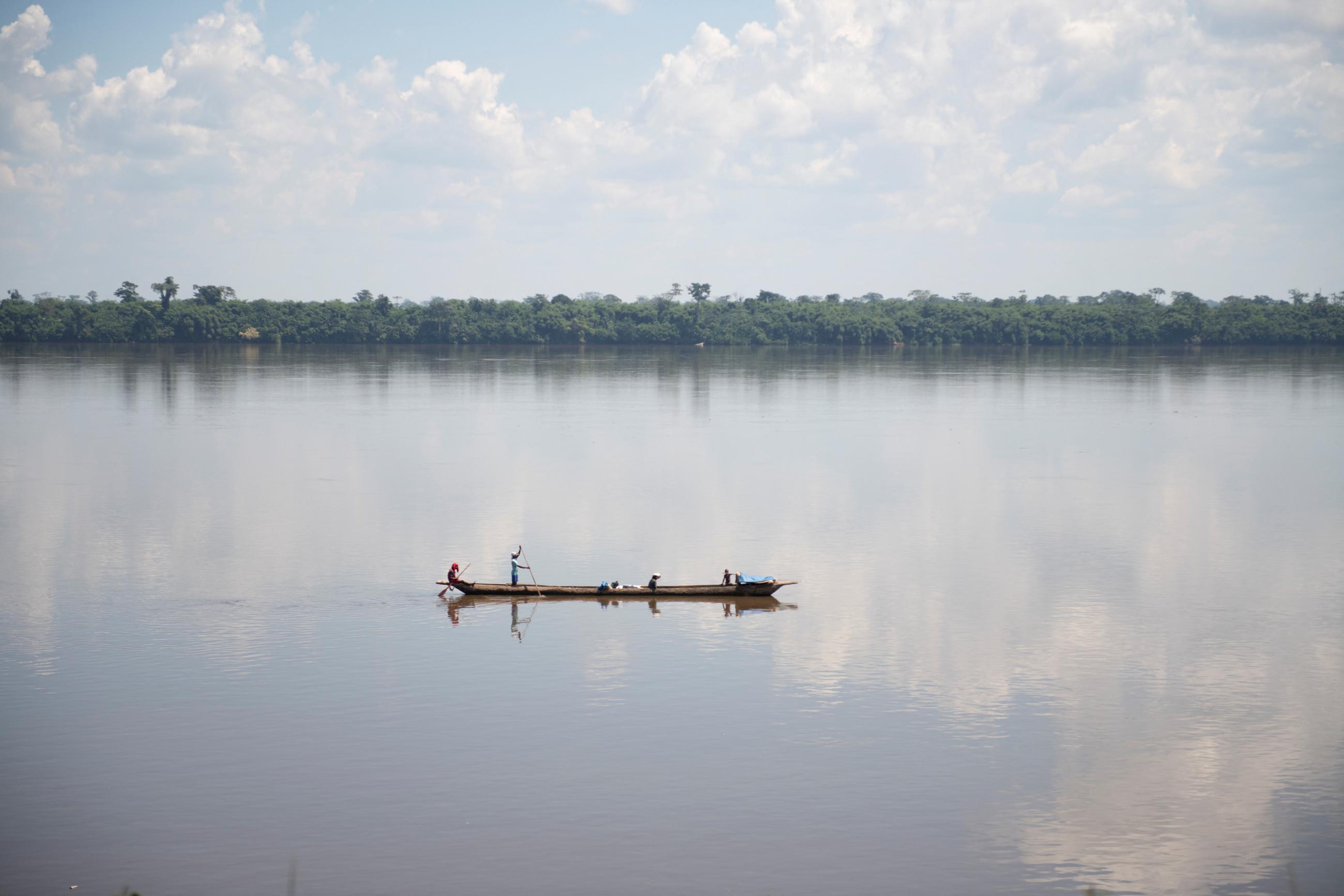 Fishermen cross the Congo River in Yakusu, Tshopo, Democratic Republic of Congo, October 1, 2022.