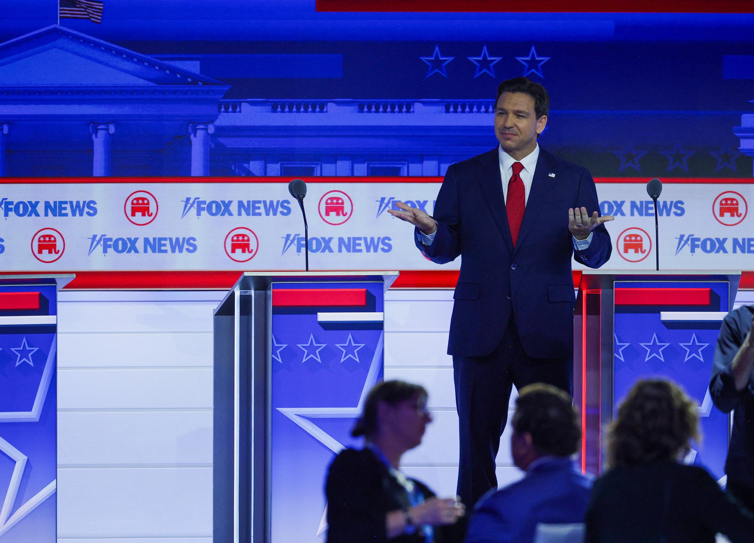 Republican presidential candidate and Florida Governor Ron DeSantis gestures towards the crowd during a commercial break at the first Republican candidates' debate of the 2024 U.S. presidential campaign in Milwaukee, Wisconsin, U.S. August 23, 2023.