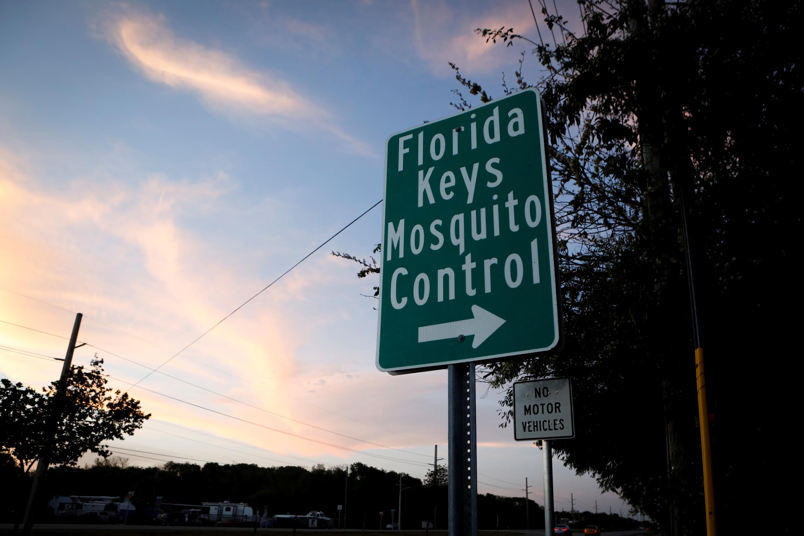 A sign is seen outside a Florida Keys Mosquito Control District branch that reads "Florida Keys Mosquito Control"
