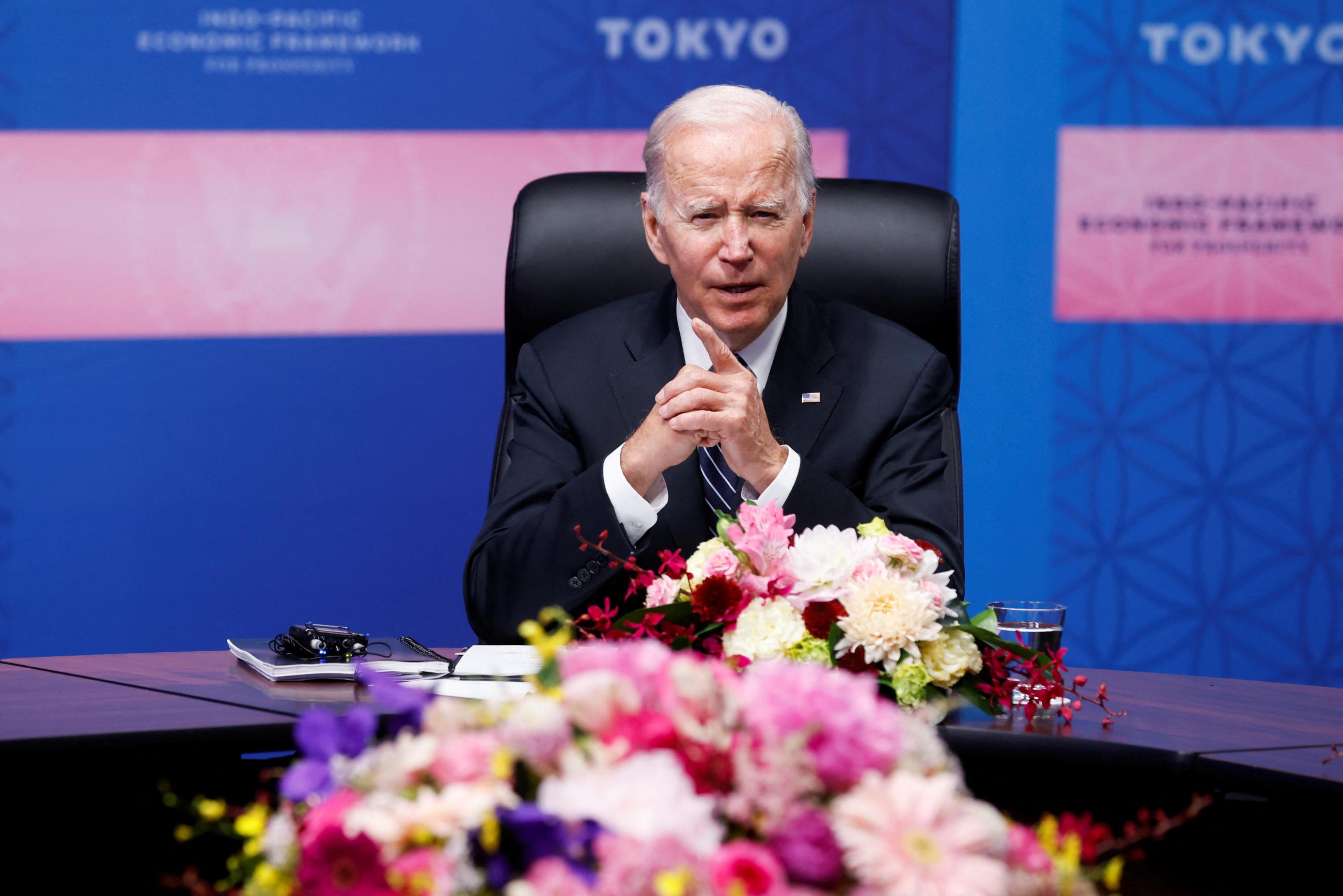U.S. President Joe Biden sits on a panel at the IPEF launch event.