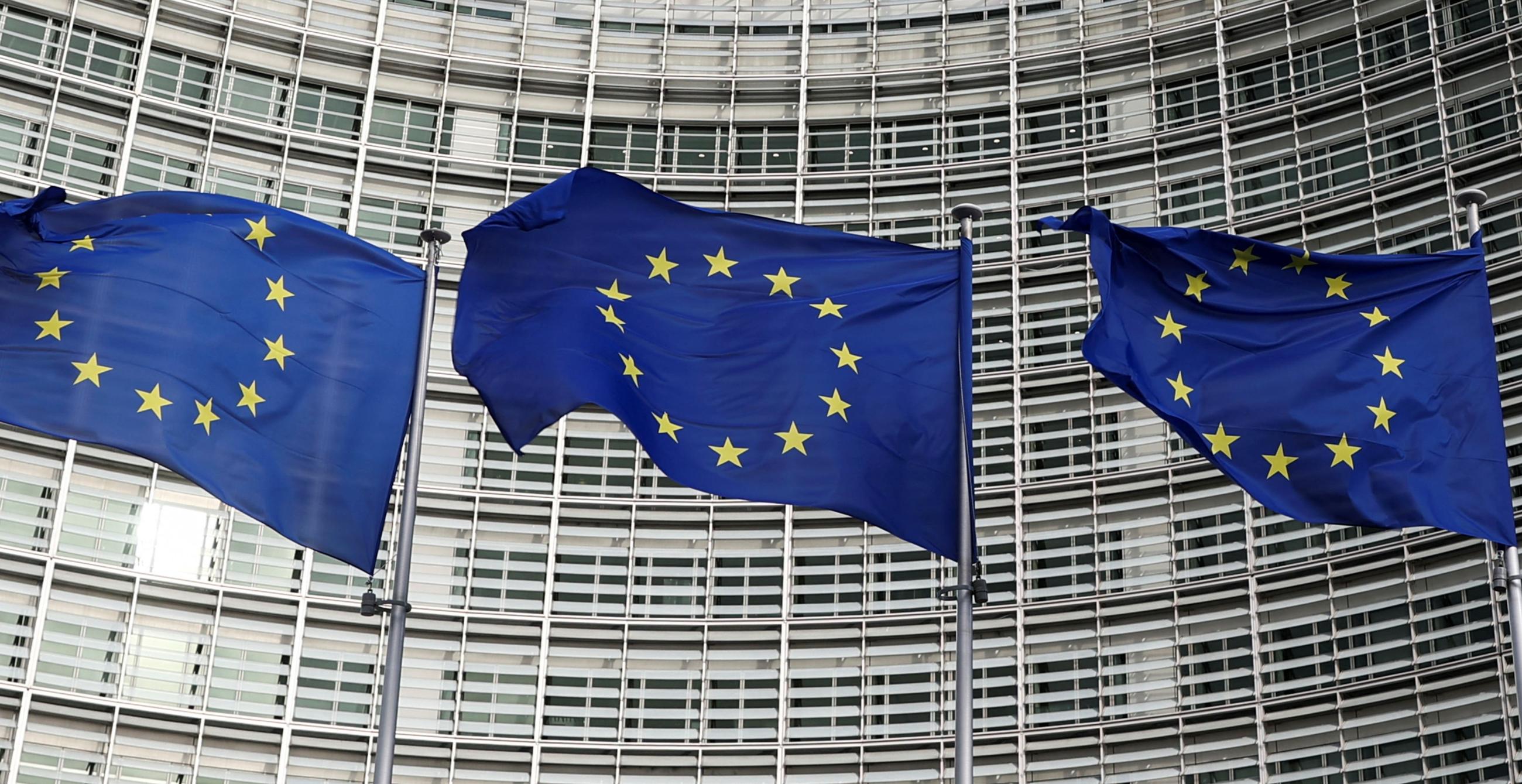 European Union flags fly outside the European Commission in Brussels.