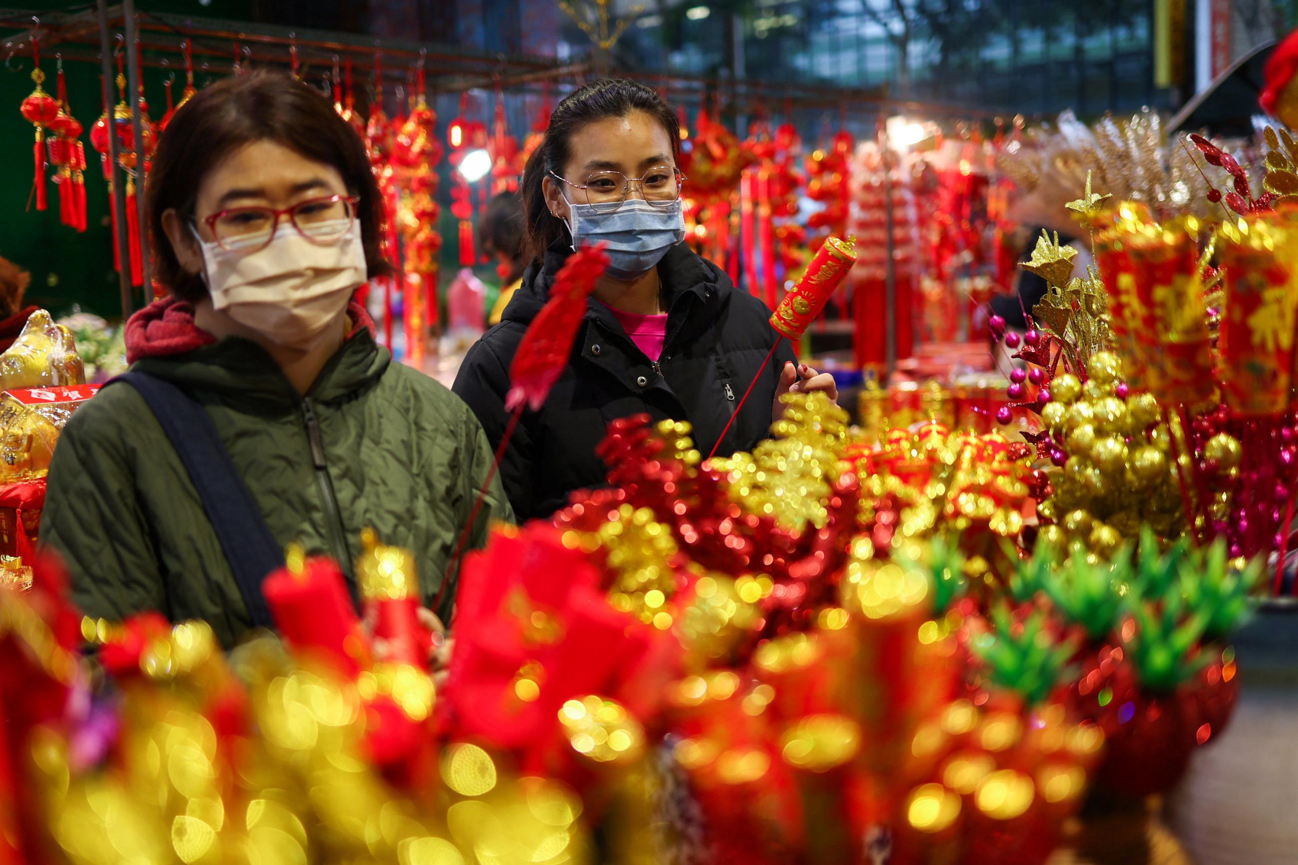 People shop at a flower market in Taiwan, February 7, 2024. A study shows global life expectancy dropped during the pandemic, but Taiwan was among seven countries and territories that fared better.