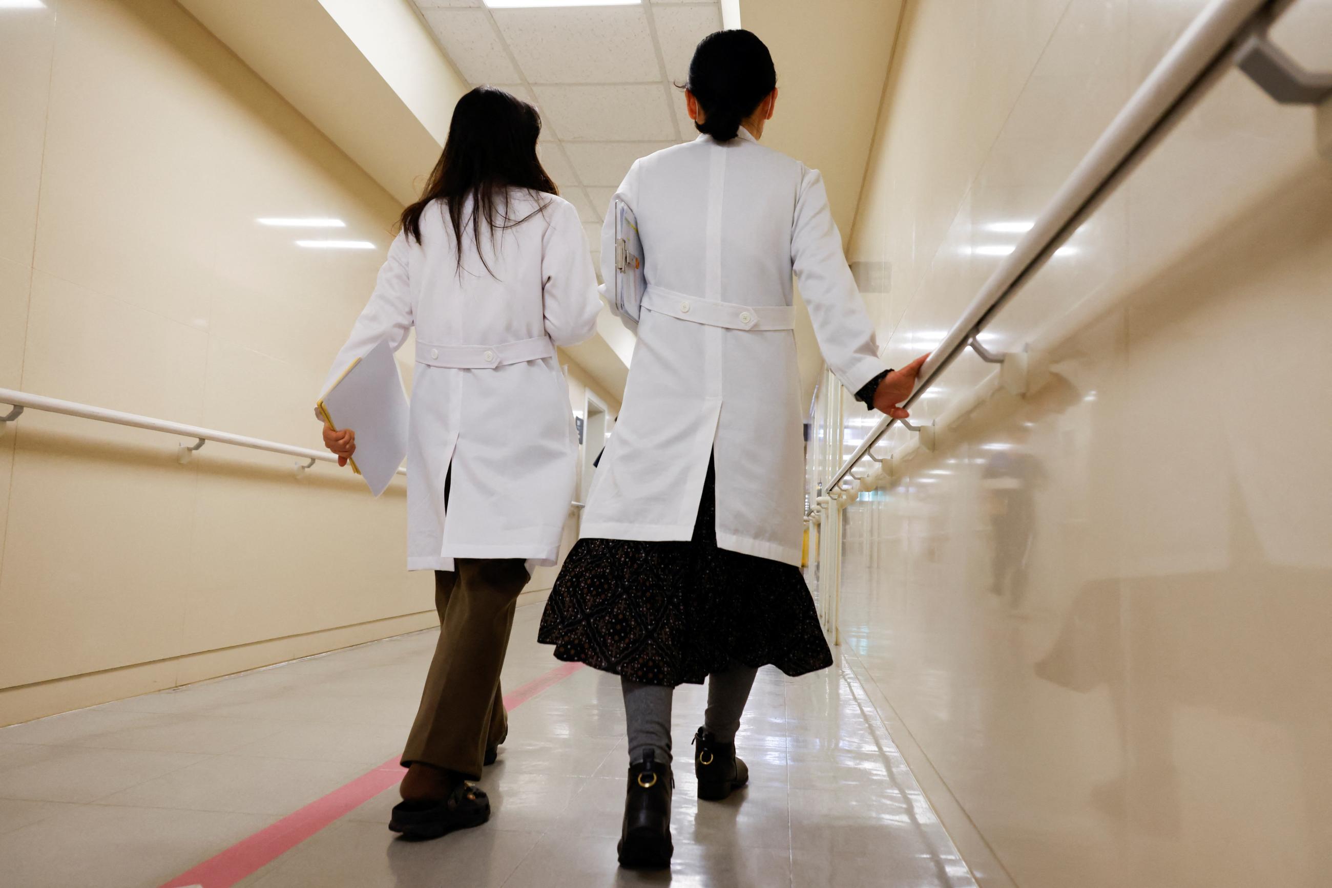 Medical workers walk at Severance Hospital.