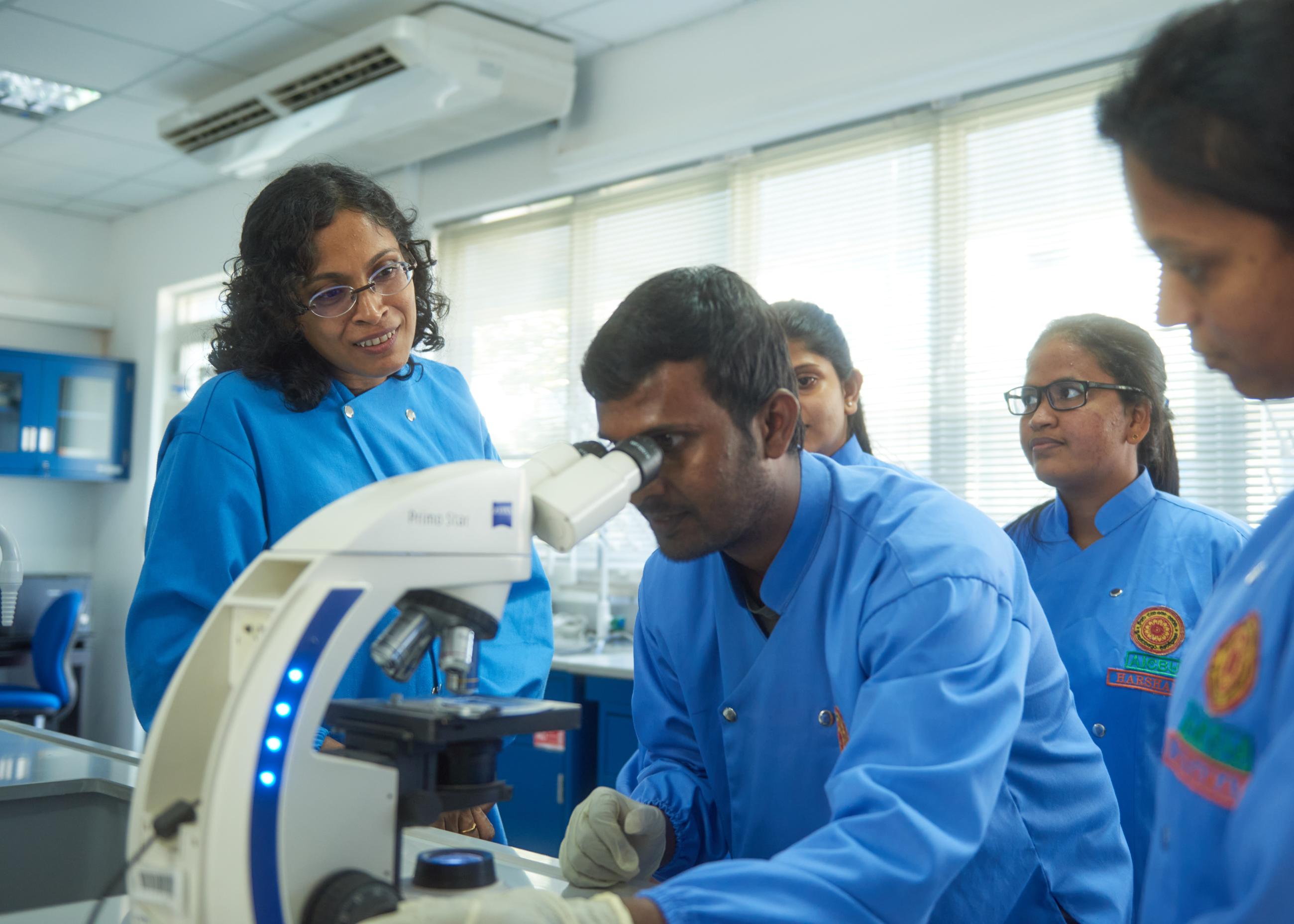 Neelika Malavige with her team at the University of Sri Jayewardenepura