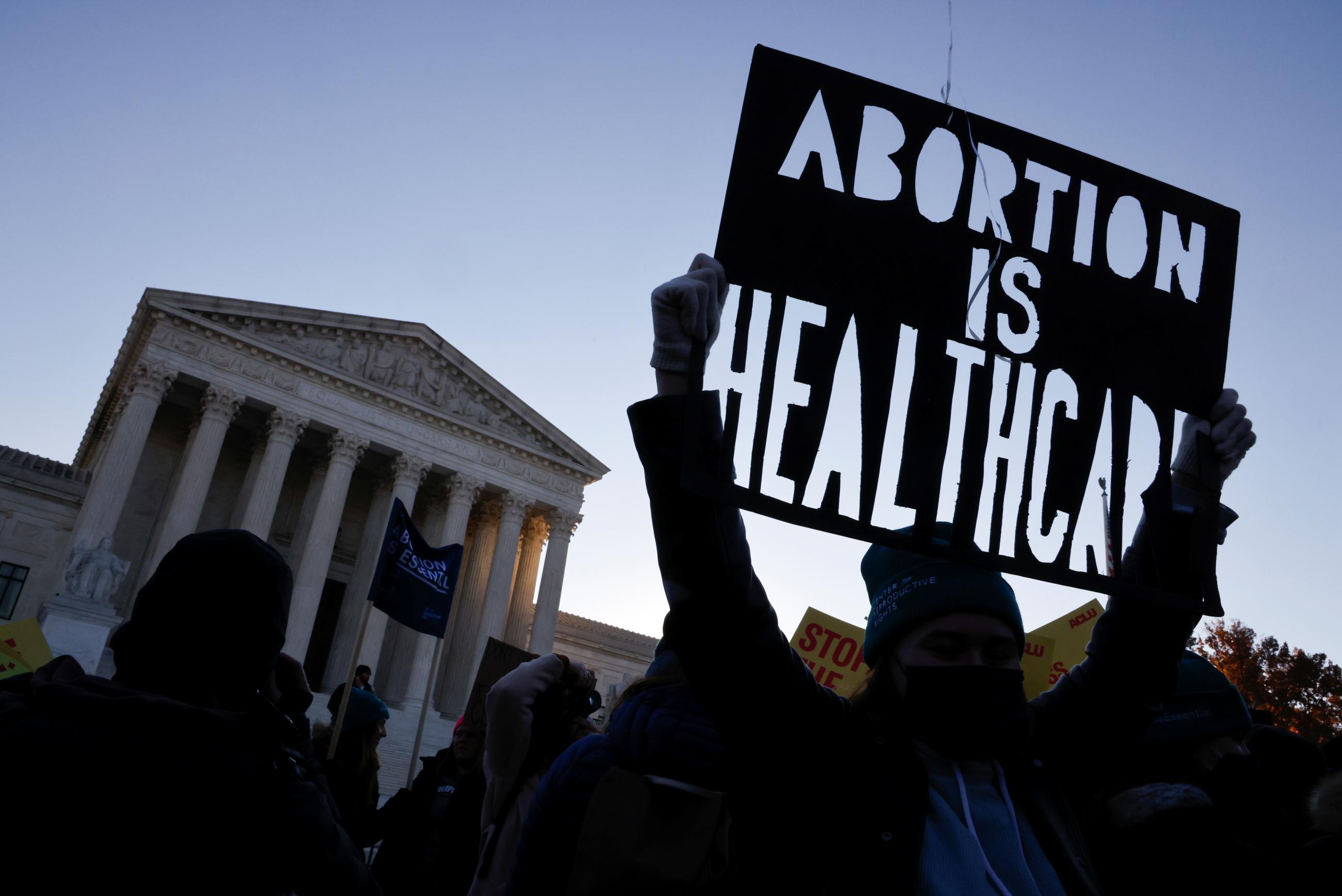 Pro-abortion rights activists protest outside the Supreme Court building.