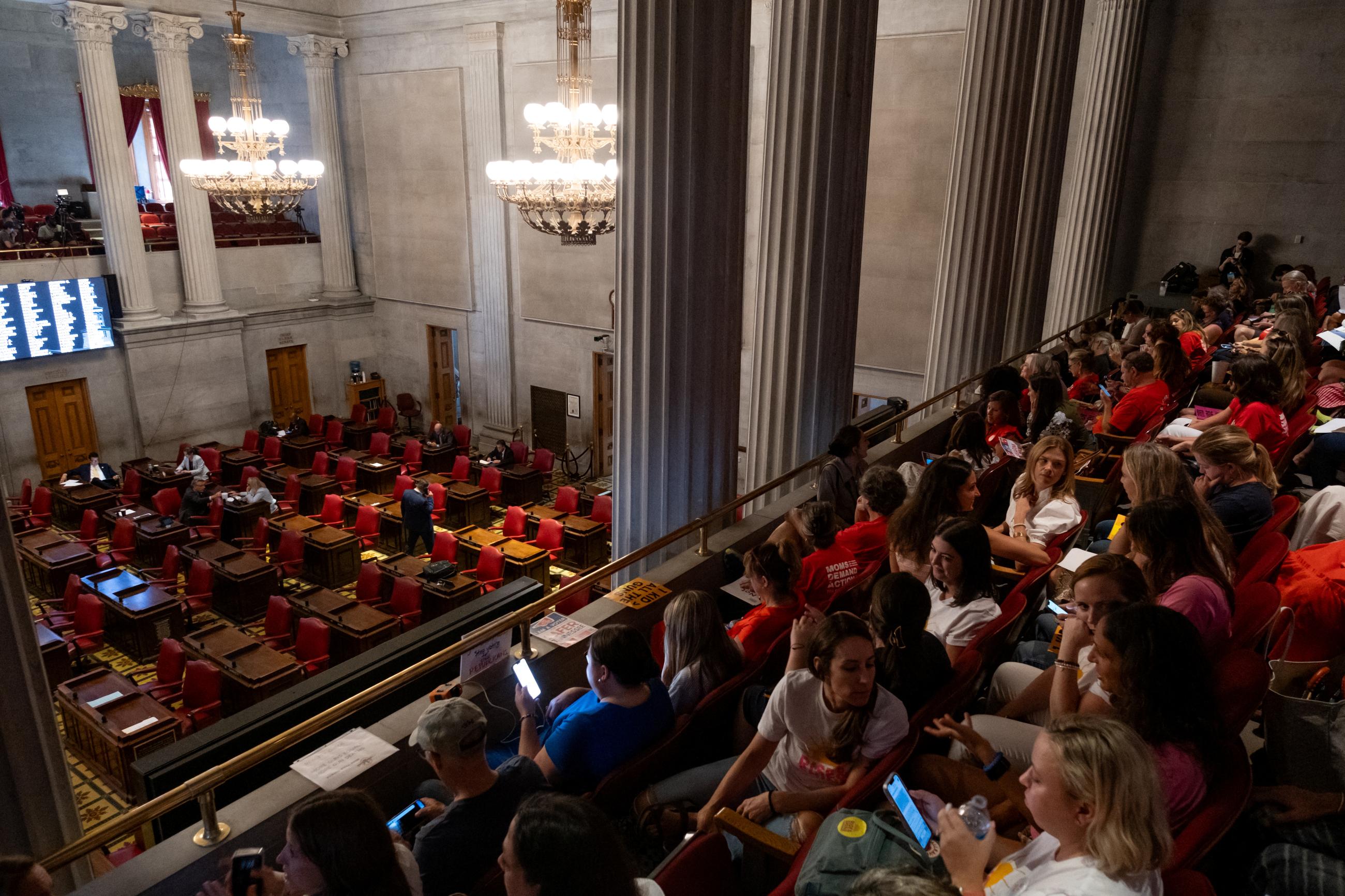 People wait for the Tennessee State House of Representatives to convene at the Tennessee State Capitol building on the fourth day of a special session on public safety to discuss gun violence in the wake of the Covenant School shooting, in Nashville, Tennessee, U.S., August 24, 2023.