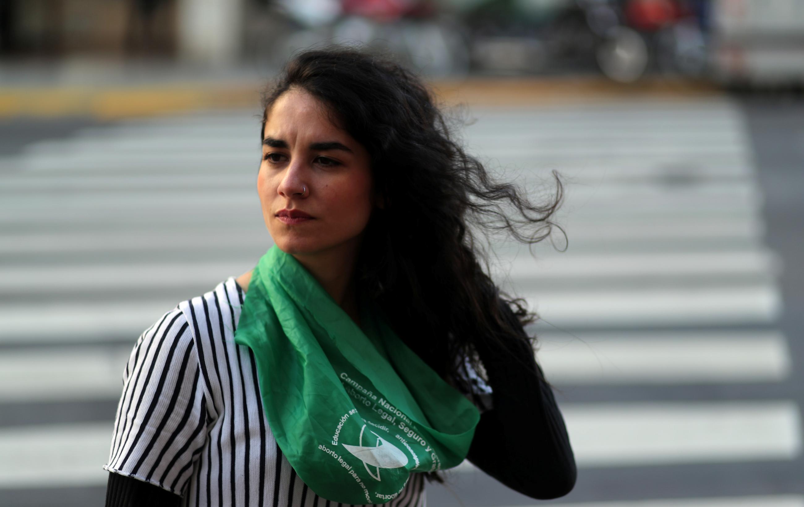 Victoria Albornoz Saroff, who had an abortion a few years ago, gestures during an interview.