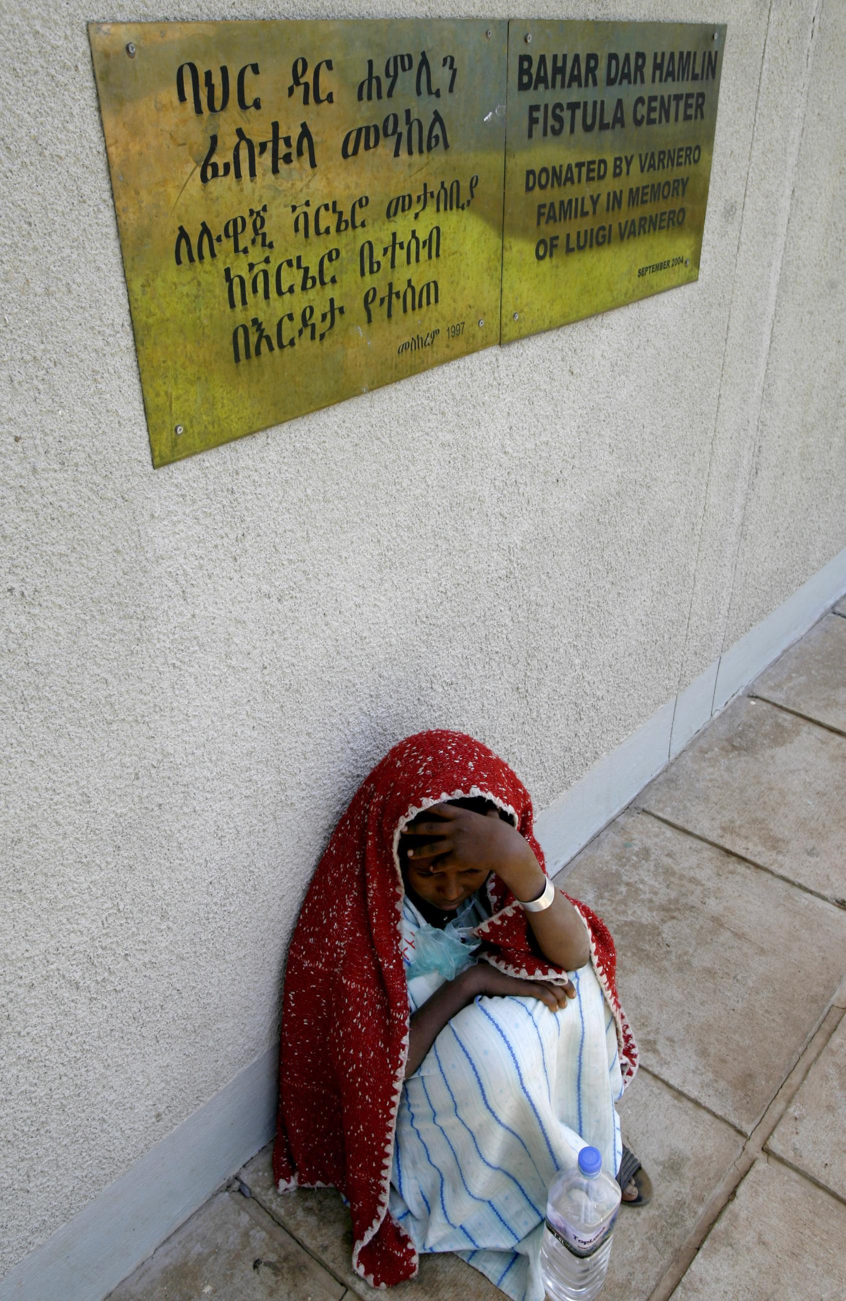 An Ethiopian woman sits outside a clinic for obstetric fistula, in Bahir Dar, Ethiopia, on March 10, 2007.