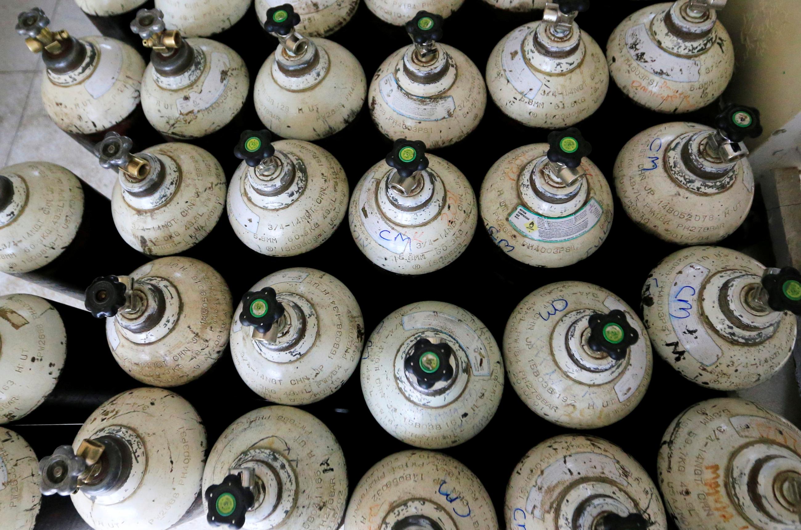 Empty oxygen cylinder tanks are seen arranged at the Hewatele oxygen plant, in Nairobi, Kenya, on August 3, 2021.