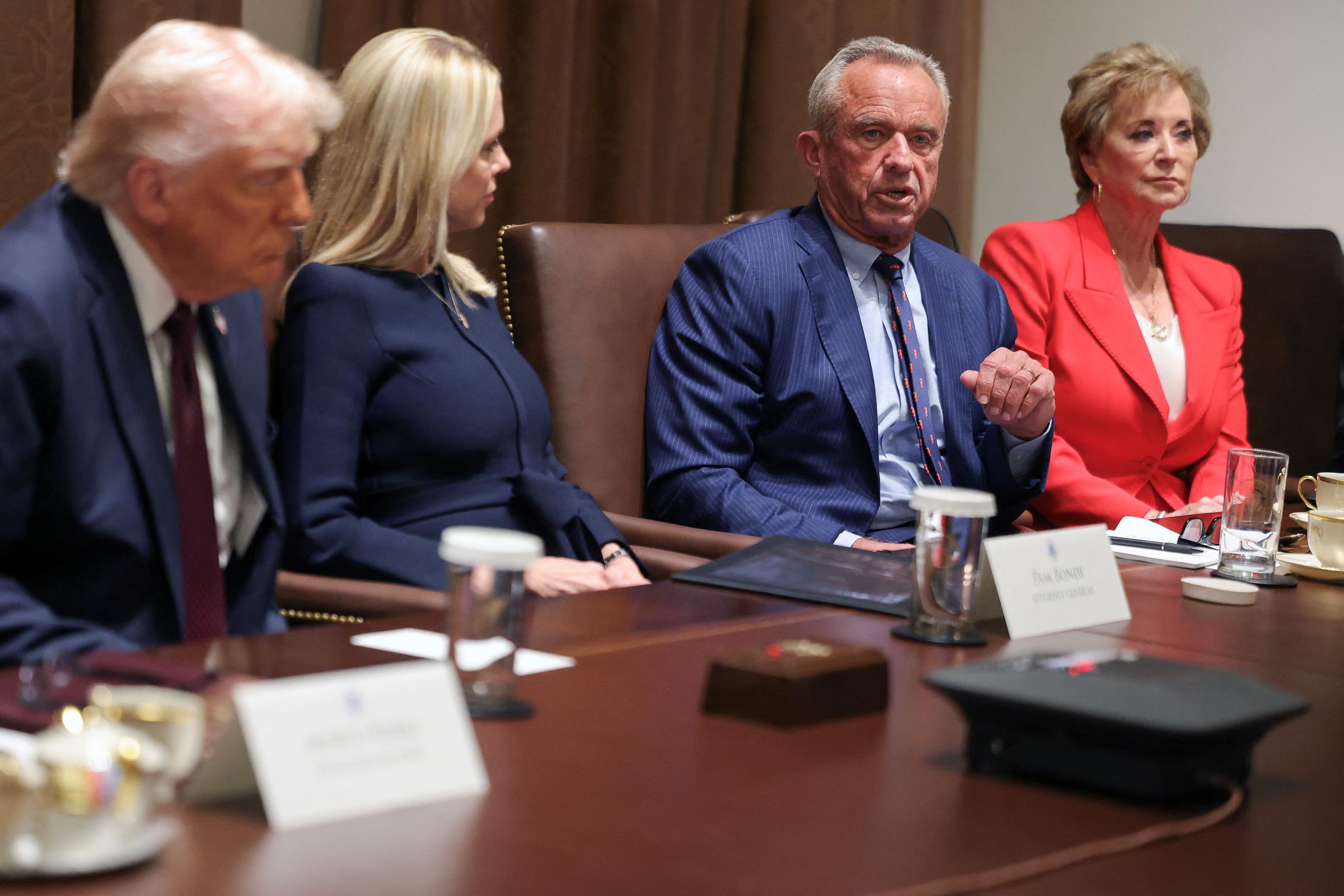 President Donald Trump, Attorney General Pam Bondi, HHS Secretary Robert F. Kennedy Jr. and Secretary of Education Linda McMahon attend a cabinet meeting, in Washington, DC, on March 24, 2025. 