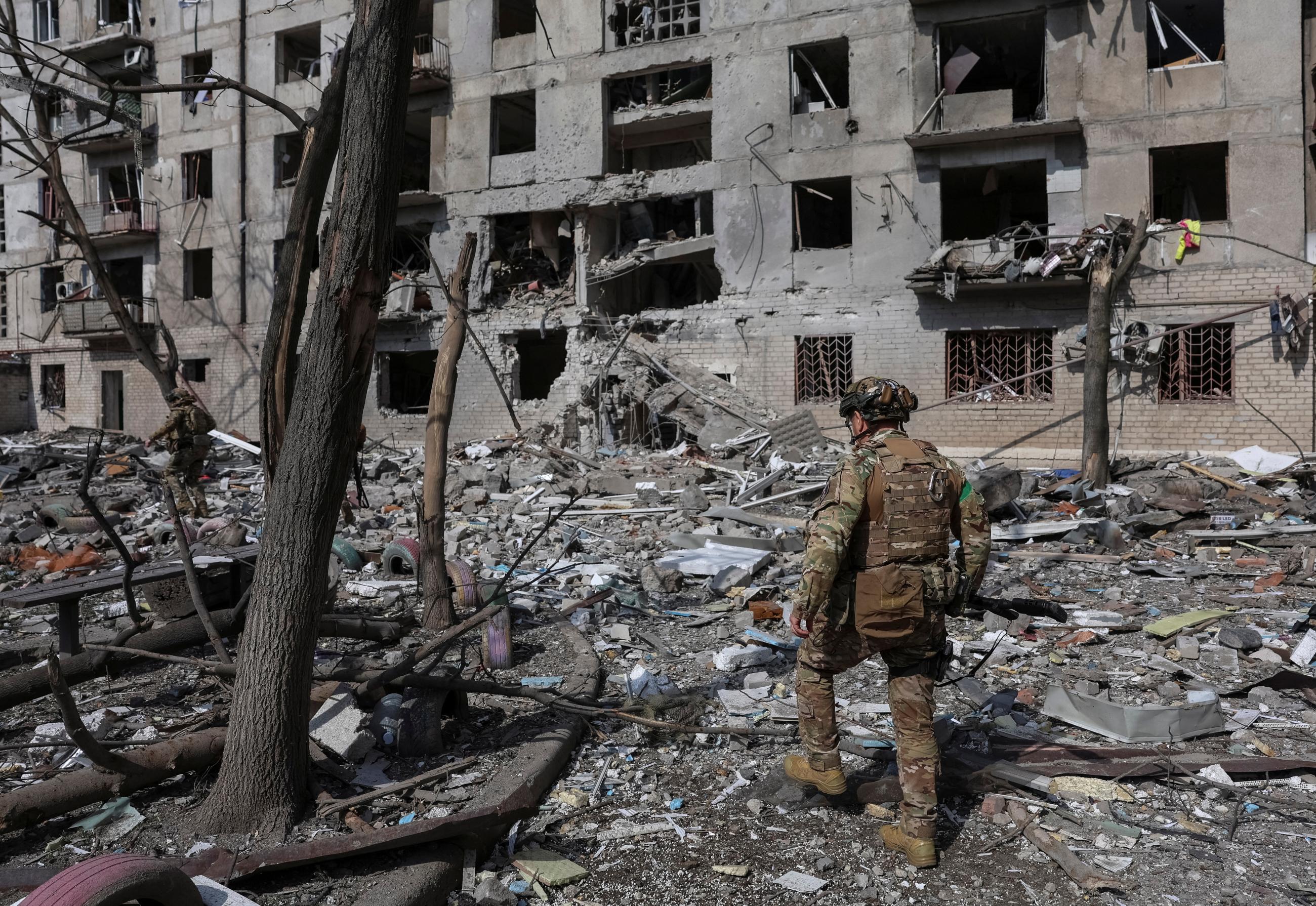 Members of the White Angel unit of Ukrainian police officers check an area for residents, amid Russia's attack on Ukraine, in Pokrovsk, on Ukraine April 12, 2025. 