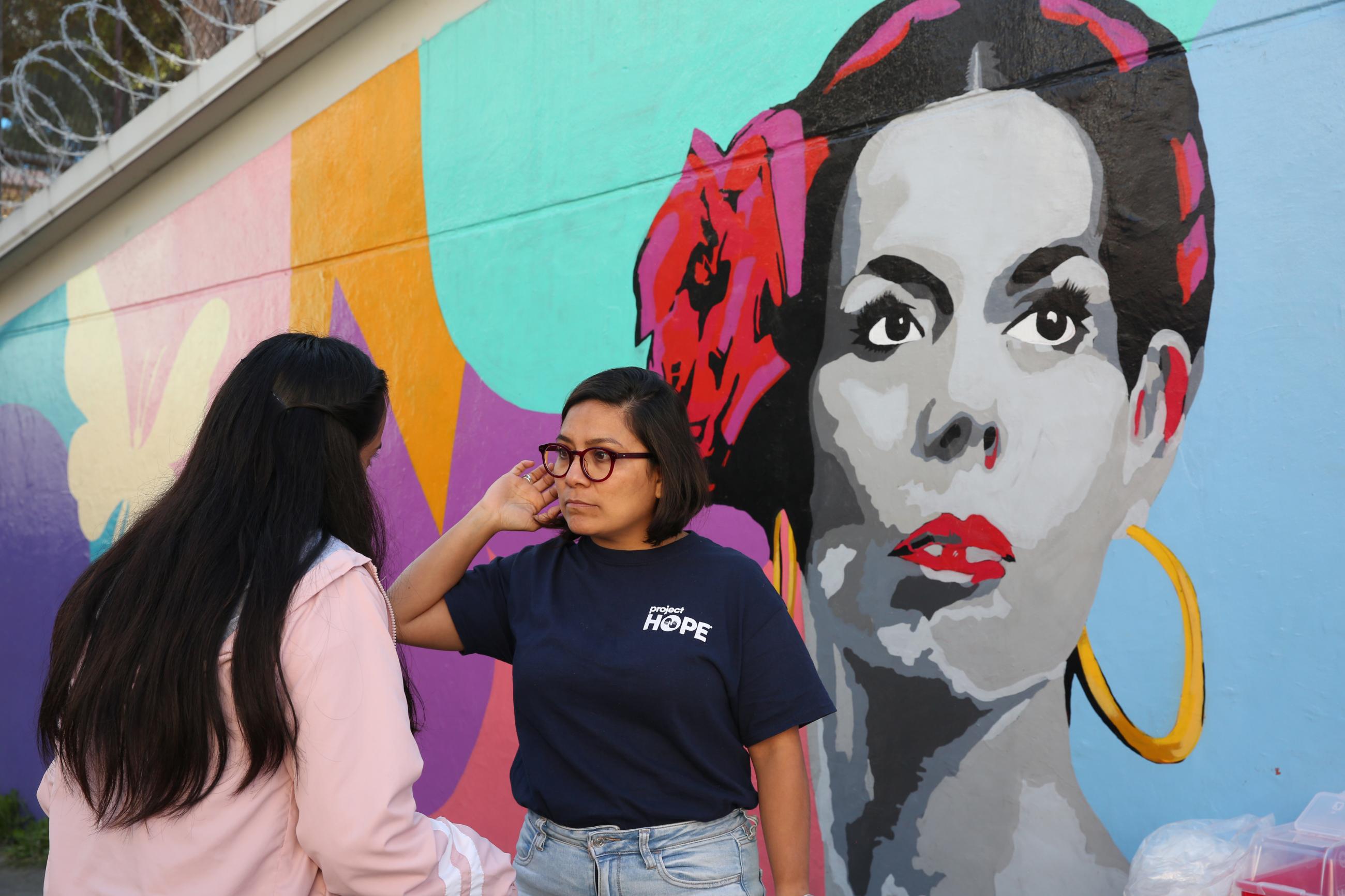 Project HOPE Mexico country director Corina Martínez (right) and health promoter Yoseline Perez (left), along with nursing students from CONALEP Tlalnepantla, provide a mobile health screening clinic to residents in the town of Tlalnepantla de Baz. Mexico.