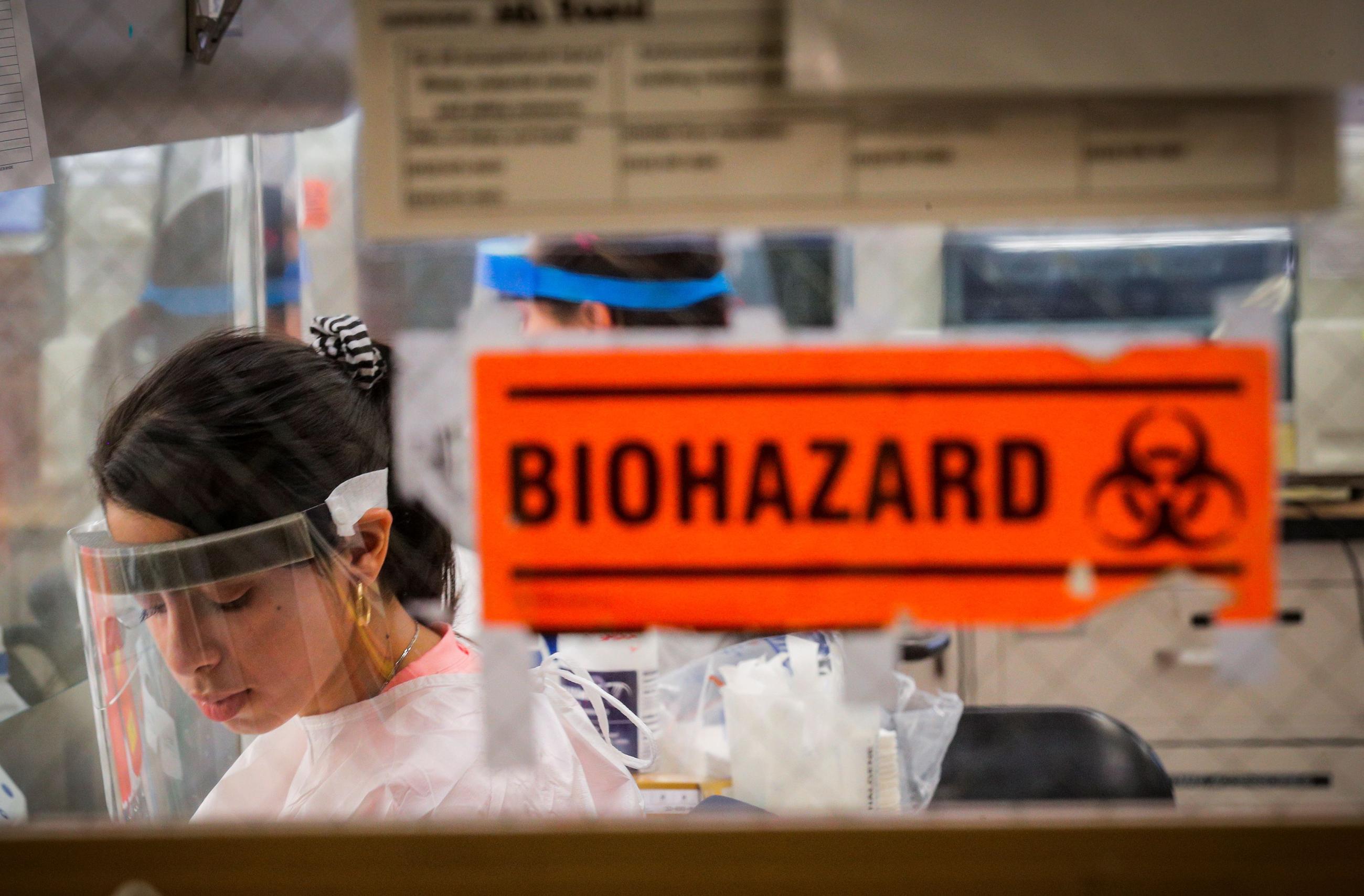 Scientists work in a lab, during the outbreak of COVID-19, in New York City, New York, on April 23, 2020.