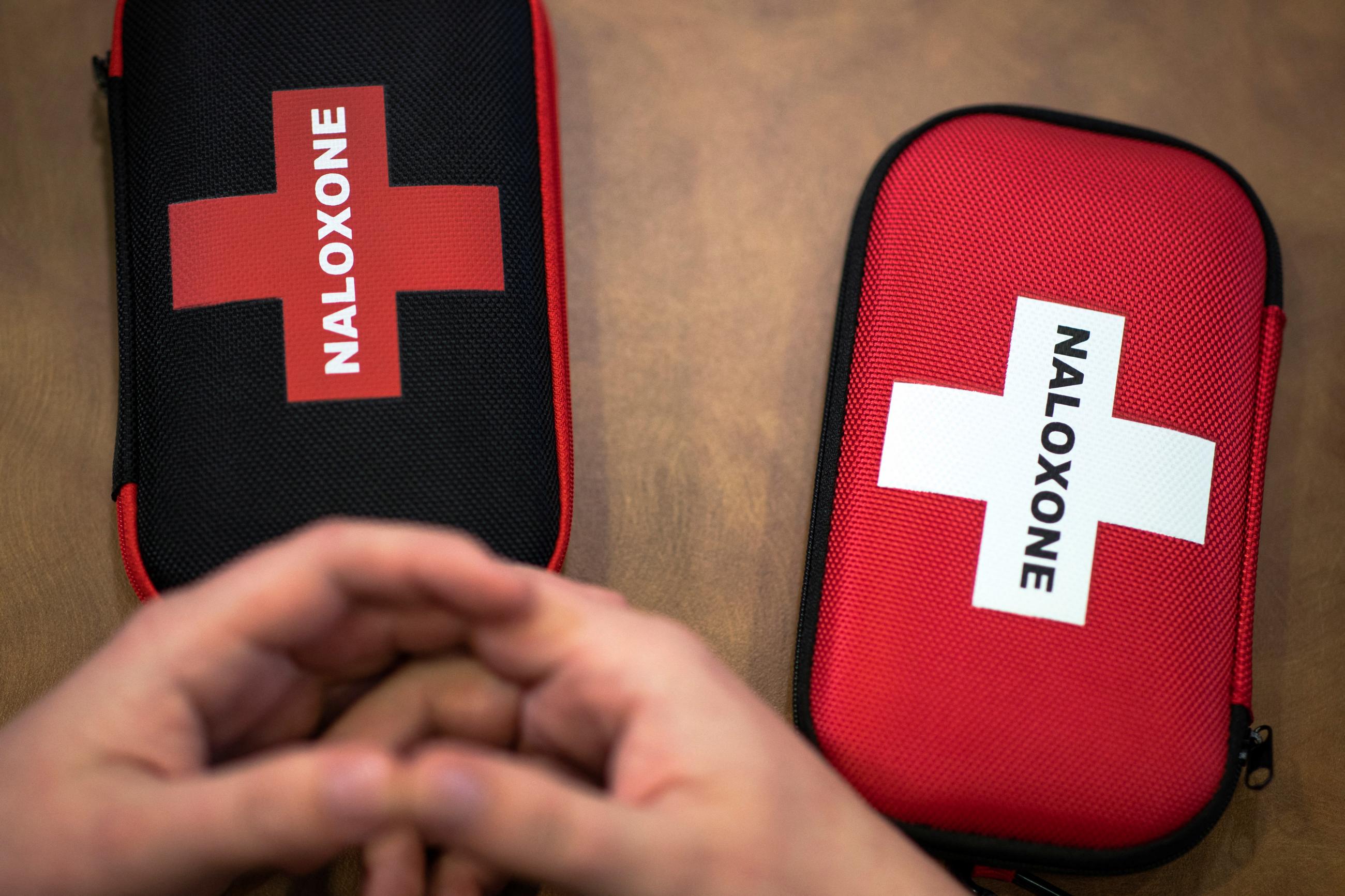 Canadian Prime Minister Justin Trudeau gets a demonstration on how to use a naloxone kit during a visit to a supervised consumption site, in Toronto, Ontario, Canada, on March 17, 2022. 