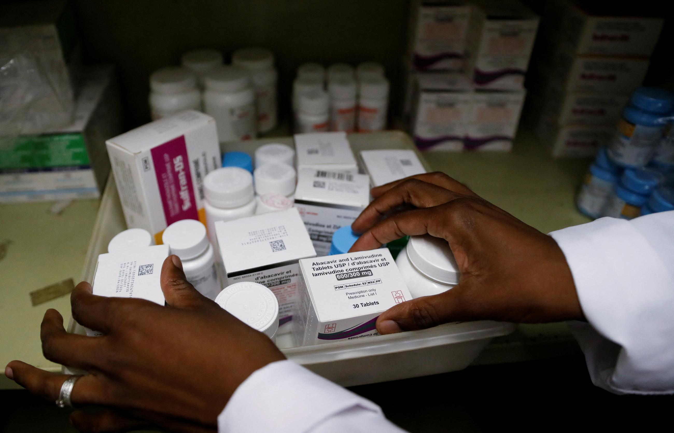 A nurse selects antiretroviral drugs used to prevent HIV from replicating, at the Nyumbani Children's Home, in Nairobi, Kenya, on February 12, 2025. 