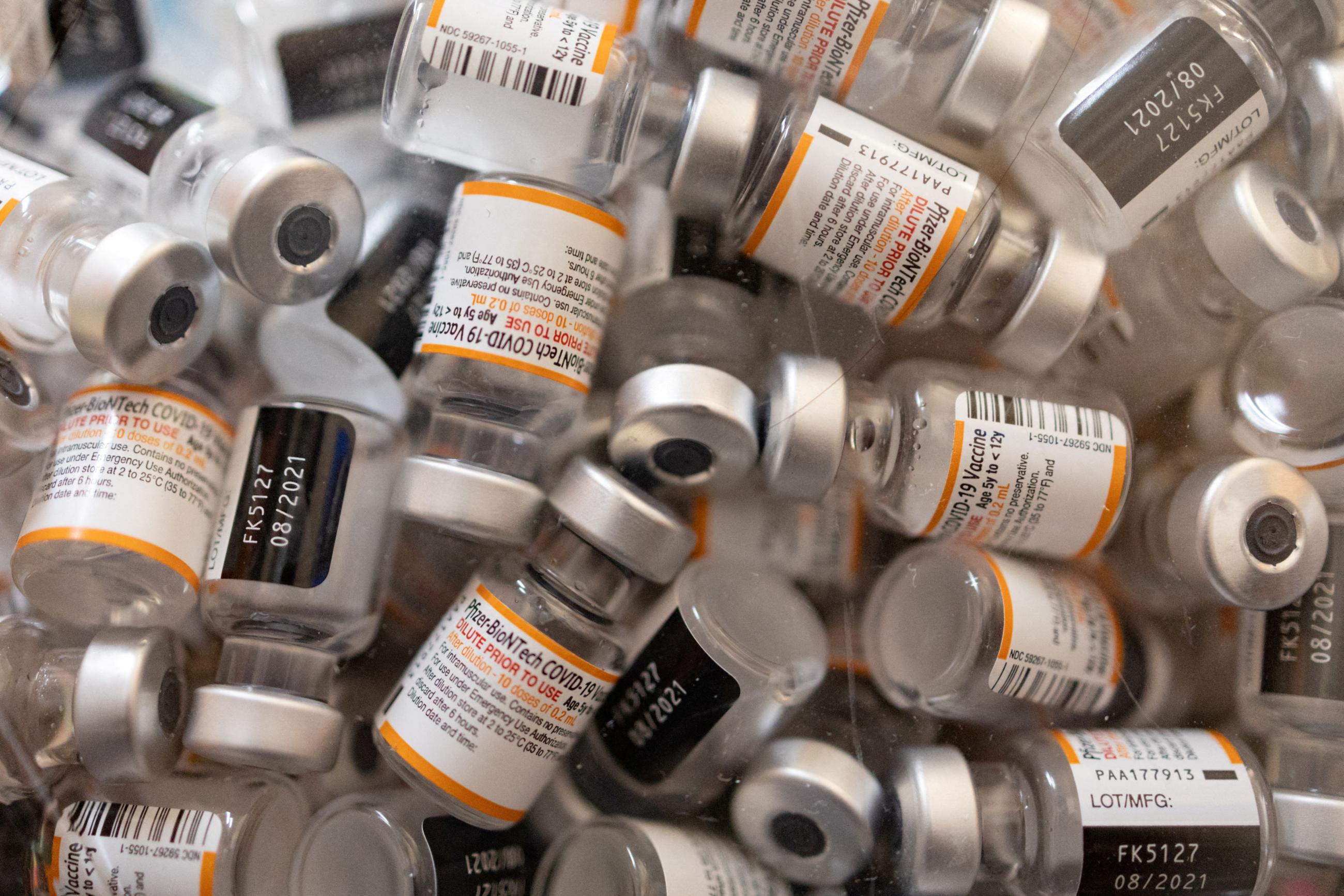 Empty vials of Pfizer-BioNTech's COVID-19 children's vaccines are seen at Skippack Pharmacy, in Schwenksville, Pennsylvania, on May 19, 2022.