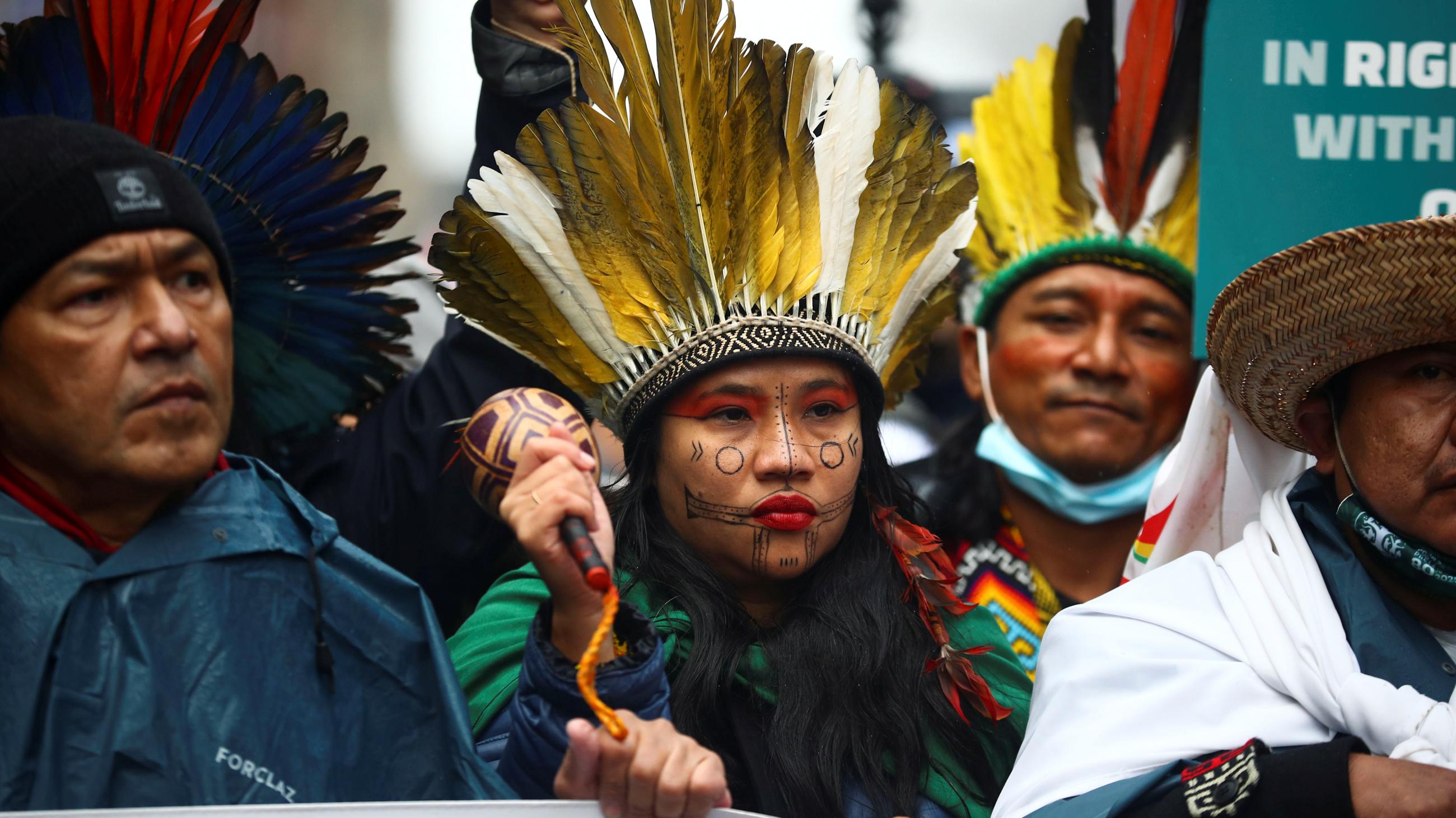 Members of Indigenous Minga attend a protest. 