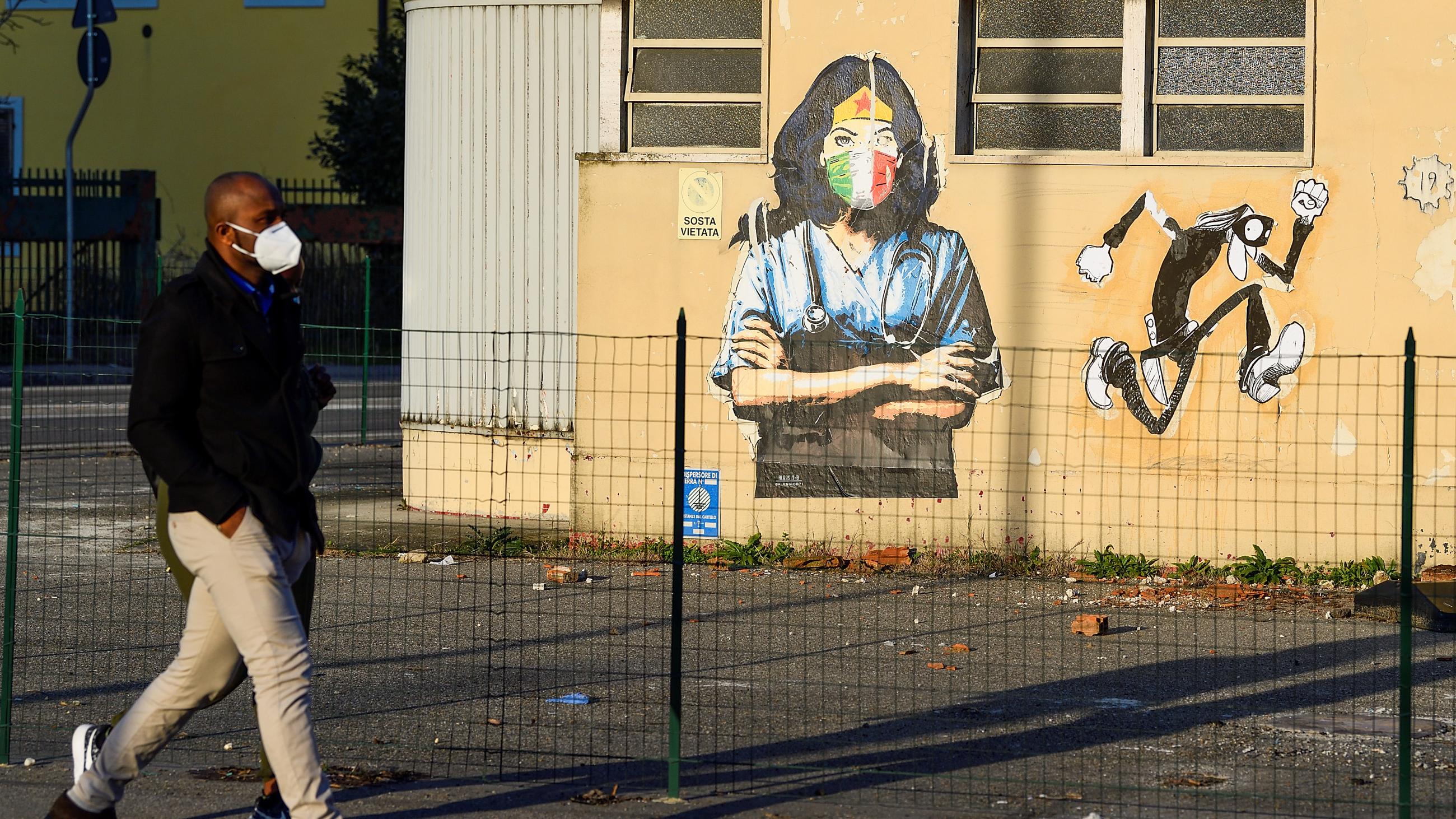 Wall art celebrates nurses in Codogno, one year after the small northern Italian town became Europe's COVID-19 epicentre, on February 11, 2021.