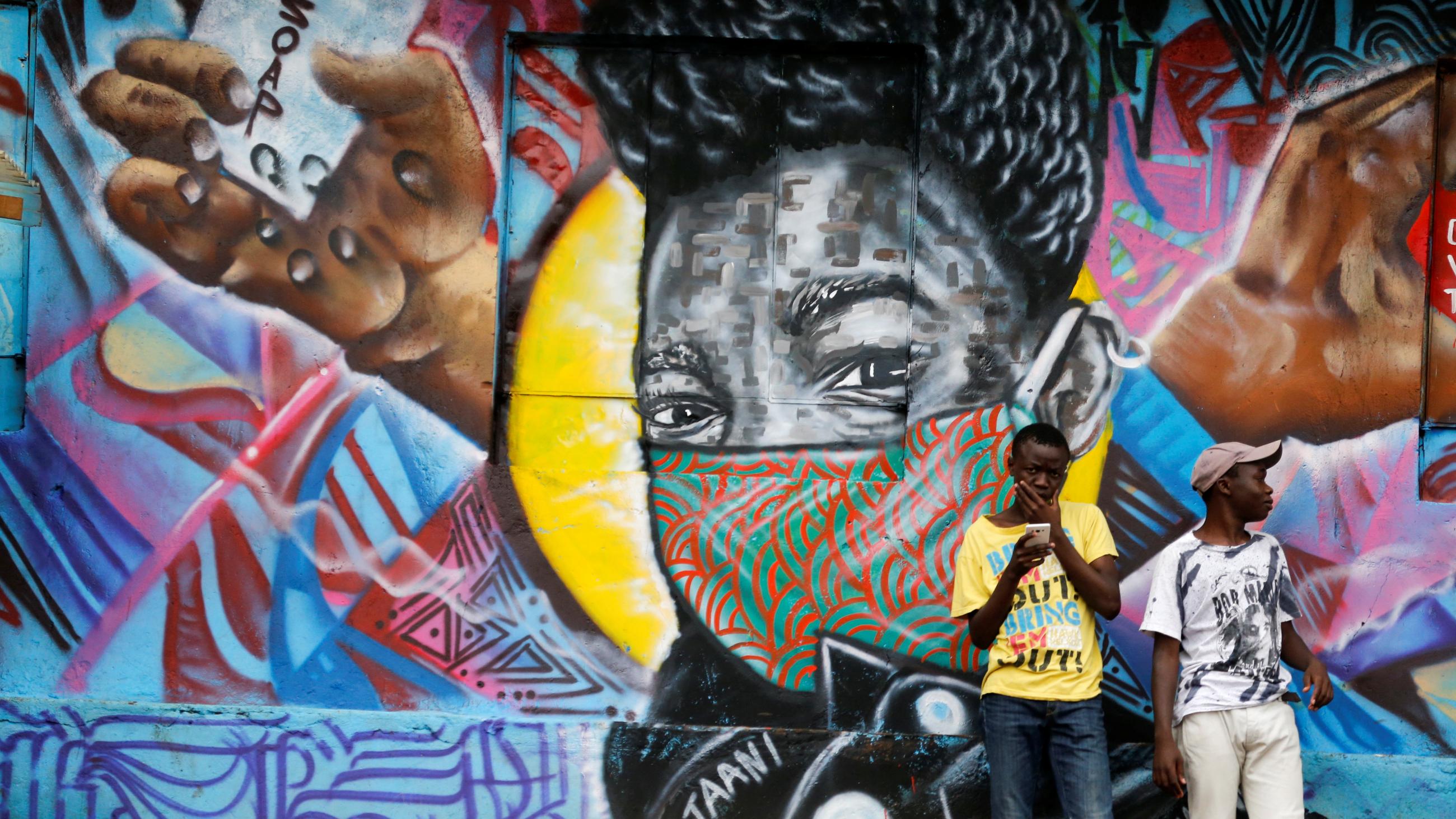 A mural by Mathare Roots Youth Group advocating safe health practices during the spread of COVID-19, Mathare Valley, in Nairobi, Kenya, on April 19, 2020. 