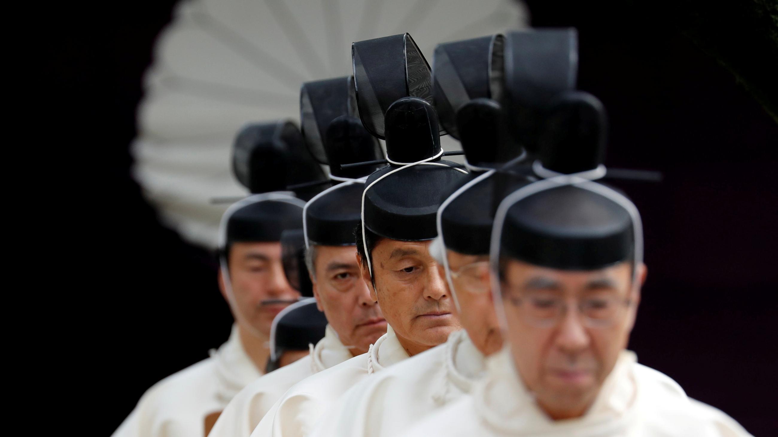 Japanese Shinto priests attend a ritual during an autumn festival at Yasukuni Shrine in Tokyo, Japan October 17, 2017. Formerly a harvest festival, Japan's Labor Thanksgiving Day is celebrated to honor labor, production, and for citizens to give each other thanks.