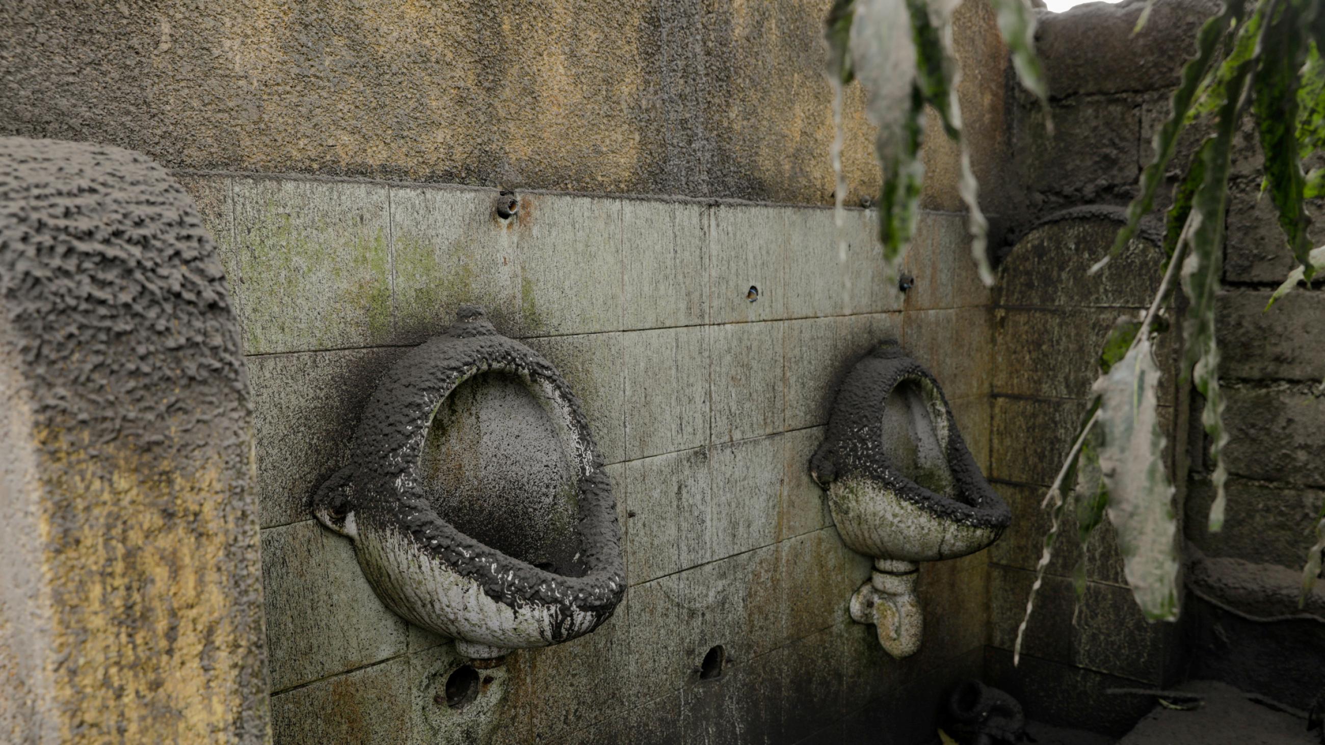 Urinals are filled with volcanic ash in a closed park in Tagaytay City, Philippines, January 14, 2020.