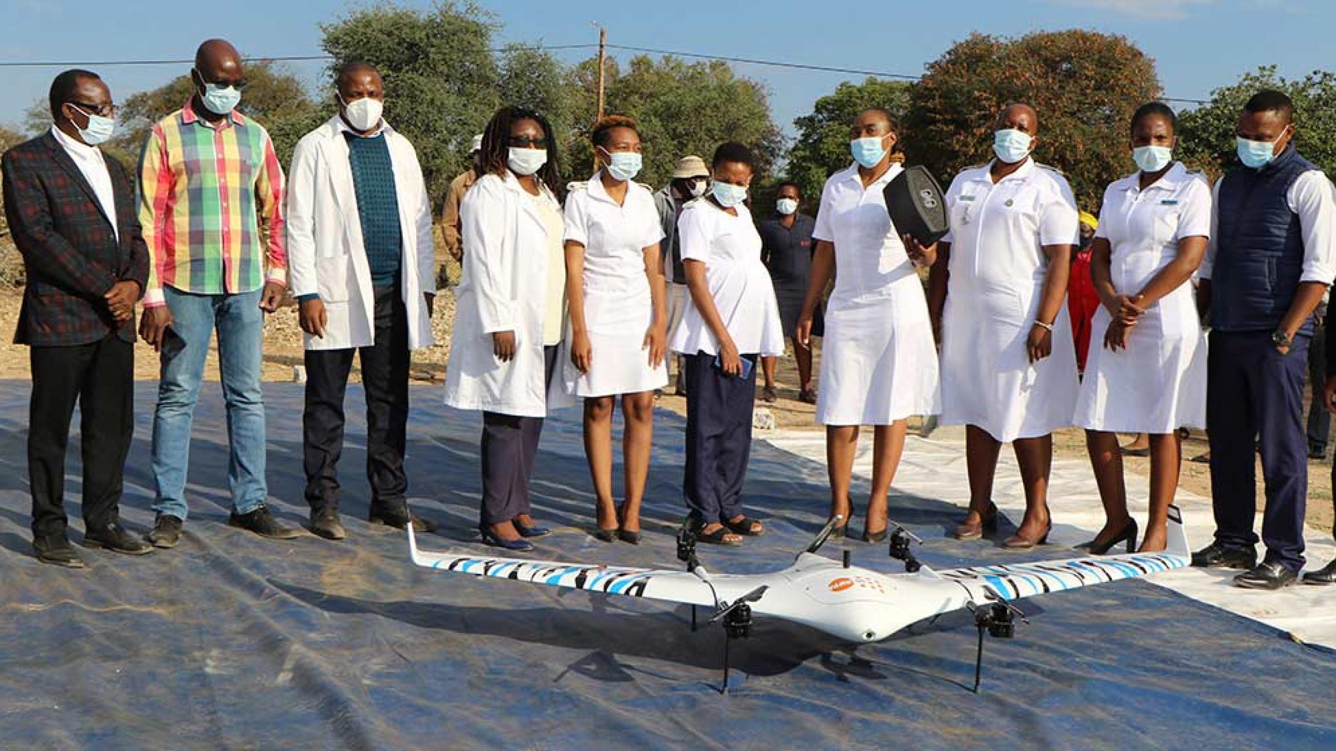 Health staff and officials gather around the drone at Lecheng Clinic, one of the four health facilities chosen for the pilot project. © UNFPA Botswana