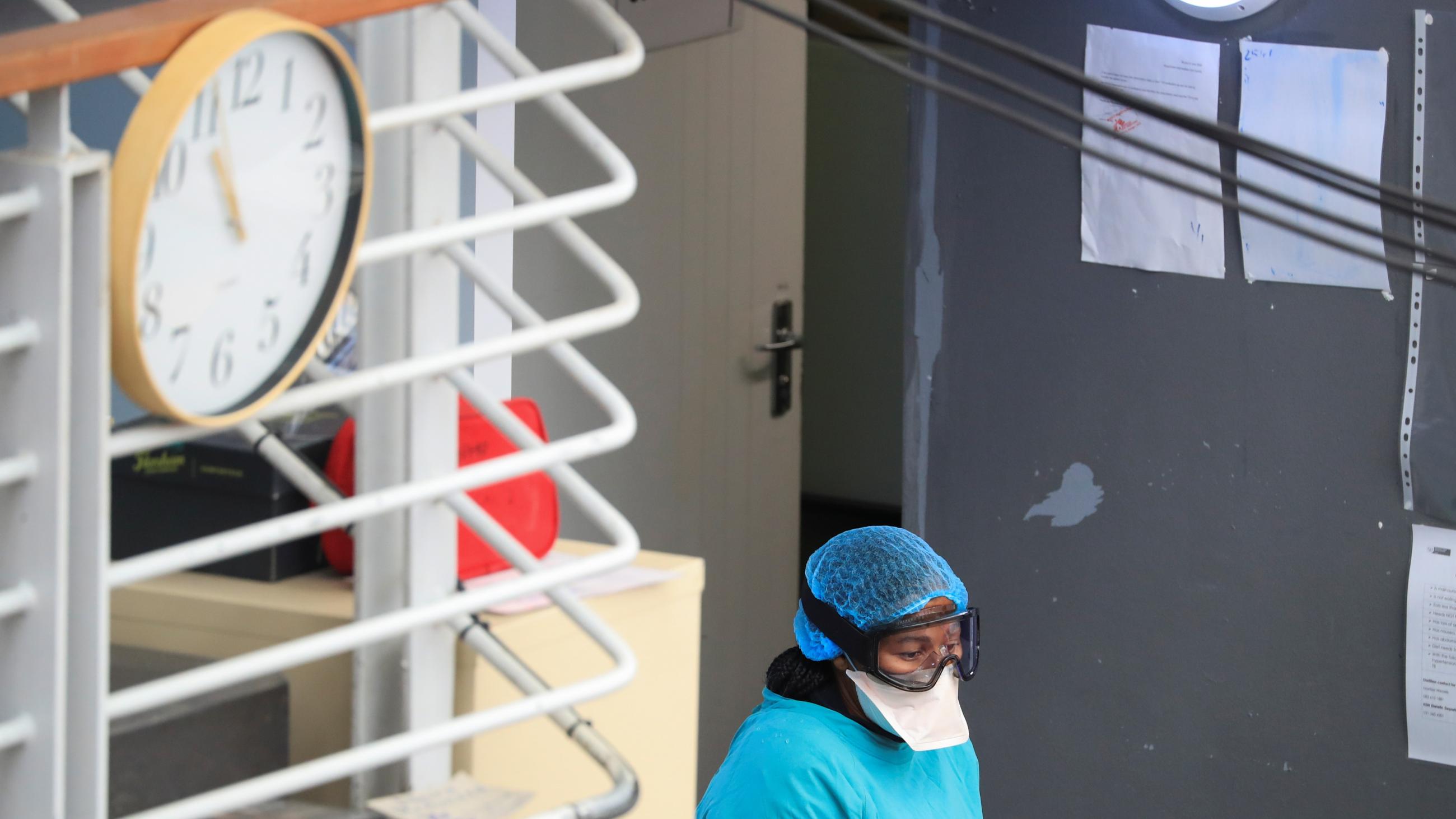 A health worker takes a break at a temporary field hospital set up by Doctors Without Borders during the coronavirus pandemic on July 21, 2020