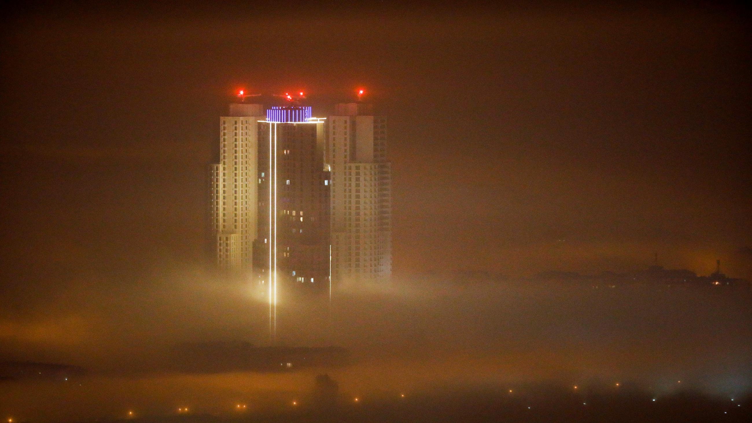 Buildings are seen as fog blankets the city of Skopje, Macedonia October 28, 2020. 