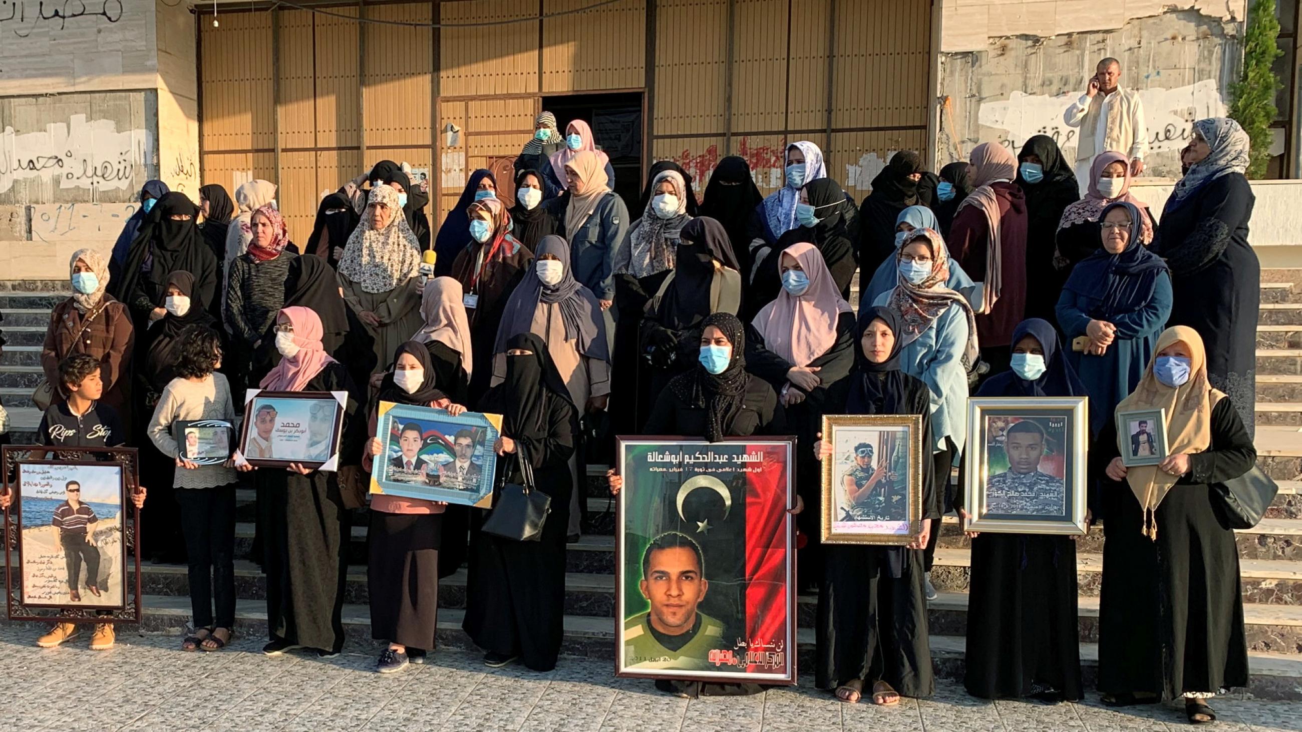 Women protest a lack of government support after losing their husbands and children to the Second Libyan War Civil War, in Misrata, Libya, on November 7, 2020.