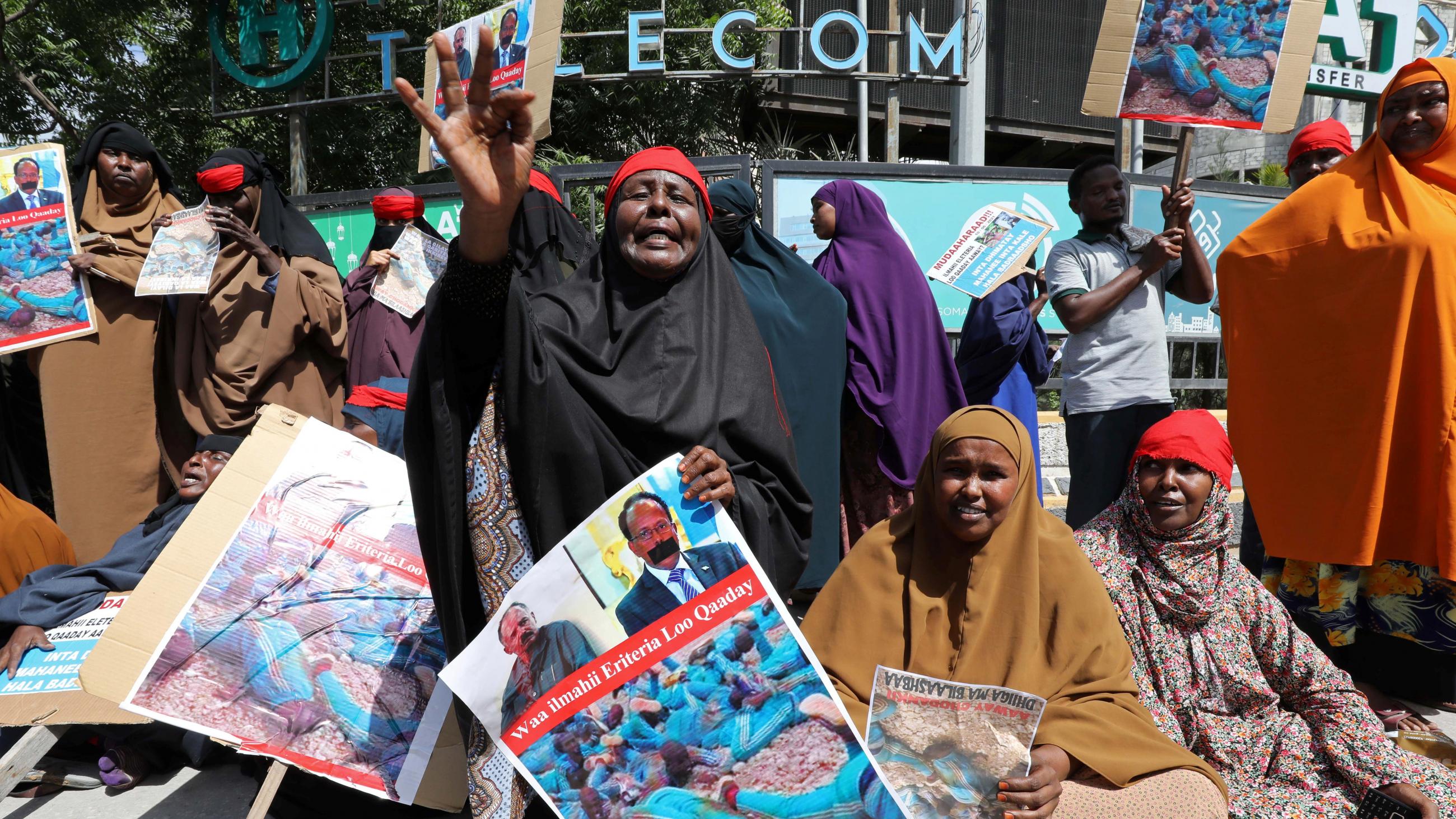 Somali women who say their sons have been used as fighters in the Tigray conflict in neighbouring Ethiopia, react during a protest in Mogadishu