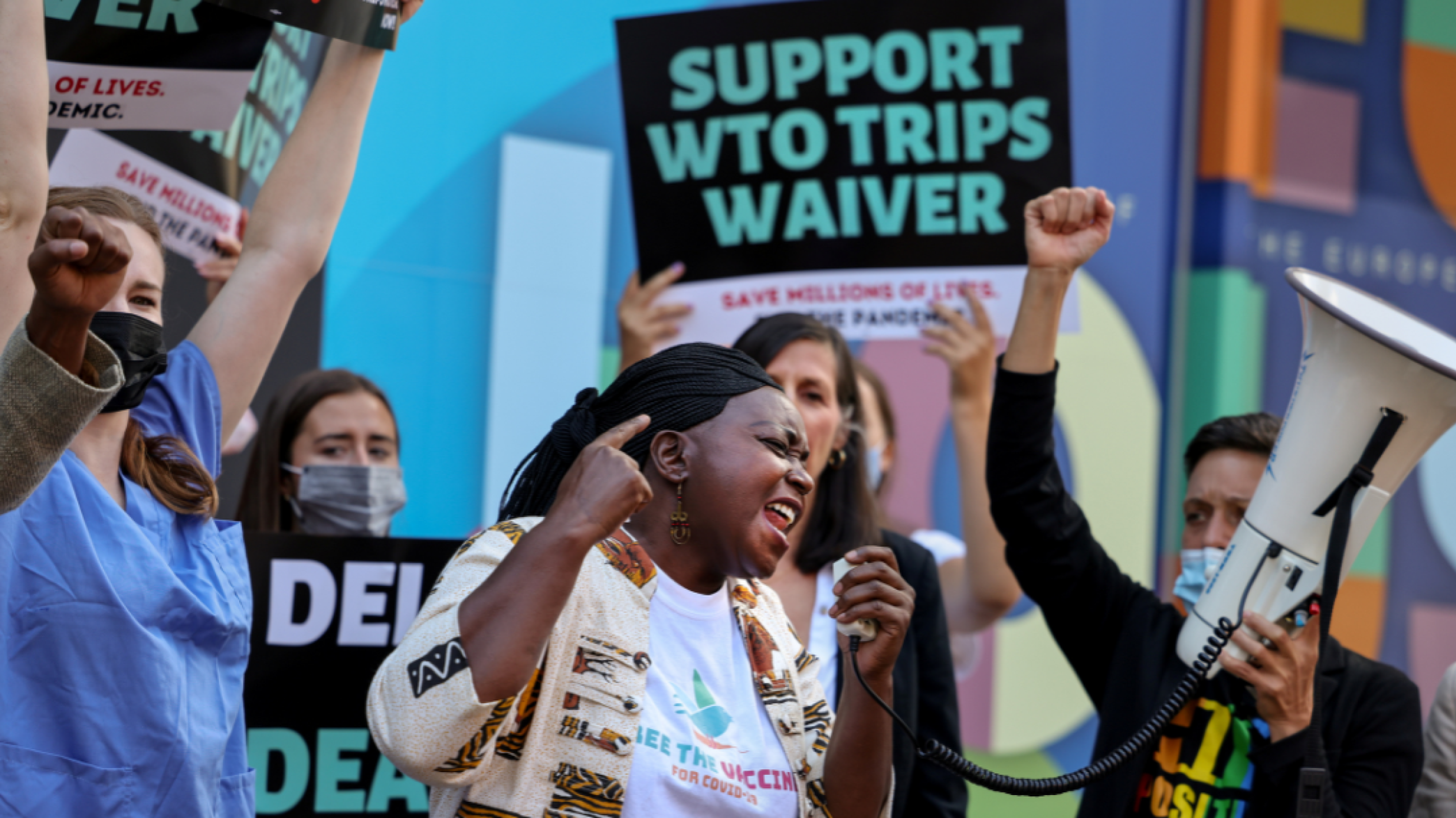 Pauline Muchina, of American Friends Service Committee, and activists call on the EU to end opposition to a COVID-19 waiver of WTO intellectual property barriers, in Washington, DC, June 24, 2021. 