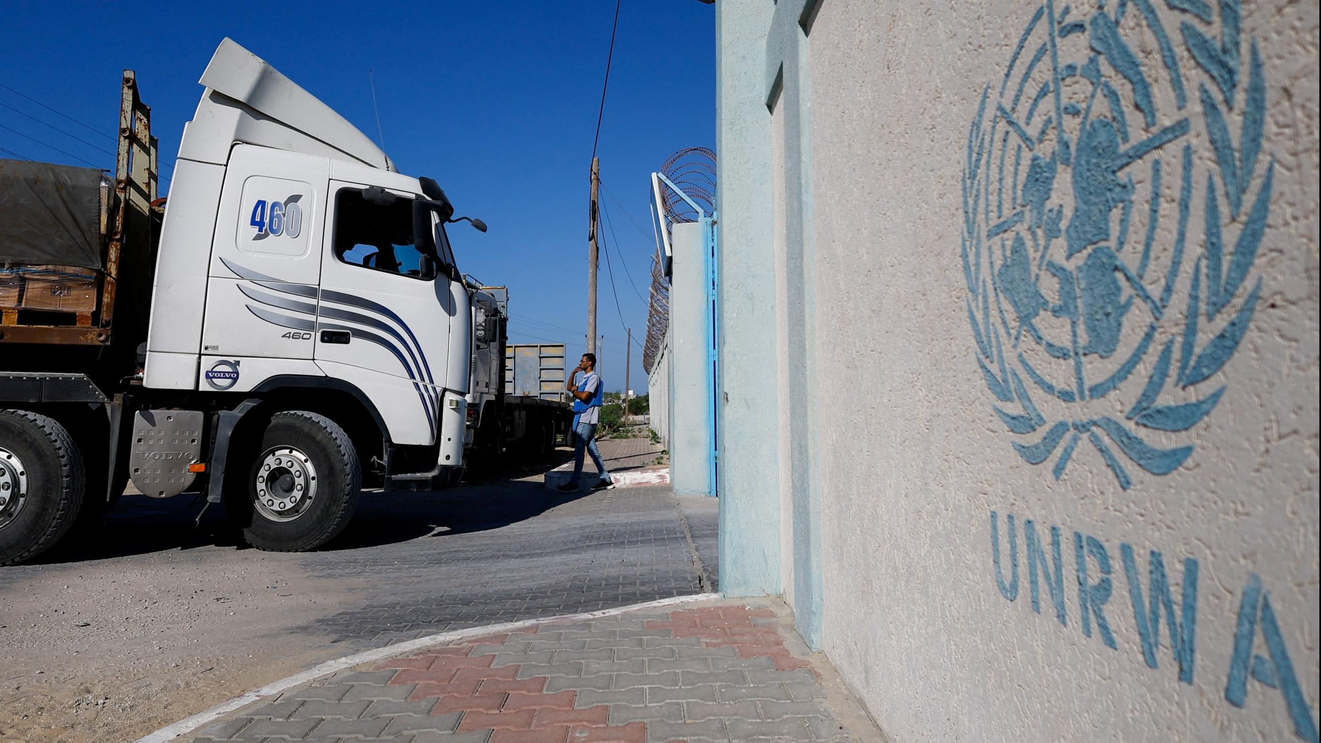 A UN Truck waits at an entrance with UNRWA label
