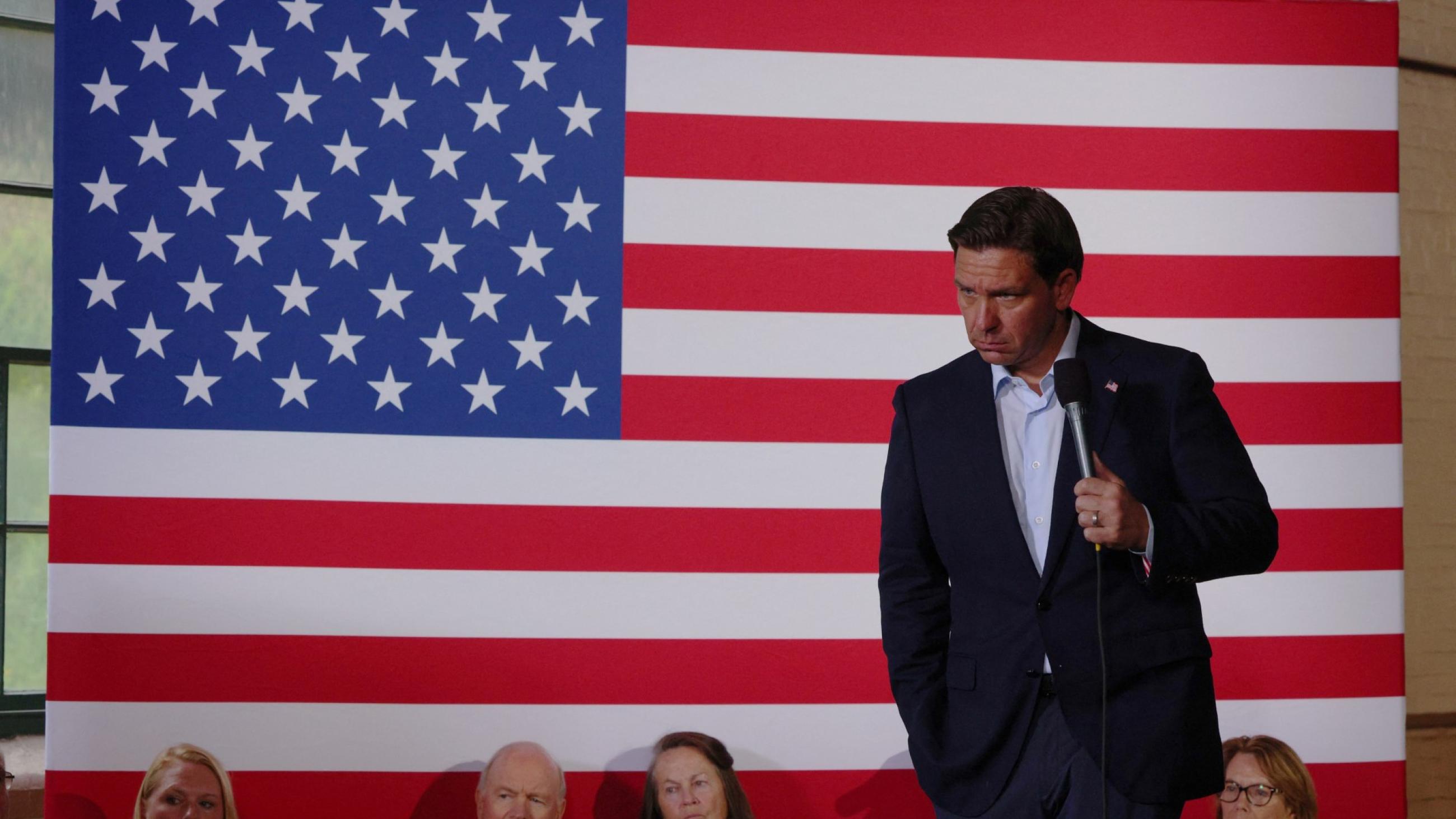 Republican presidential candidate and Florida Governor Ron DeSantis listens to a question from the audience at a campaign town hall meeting in Newport, New Hampshire, U.S., August 19, 2023. 