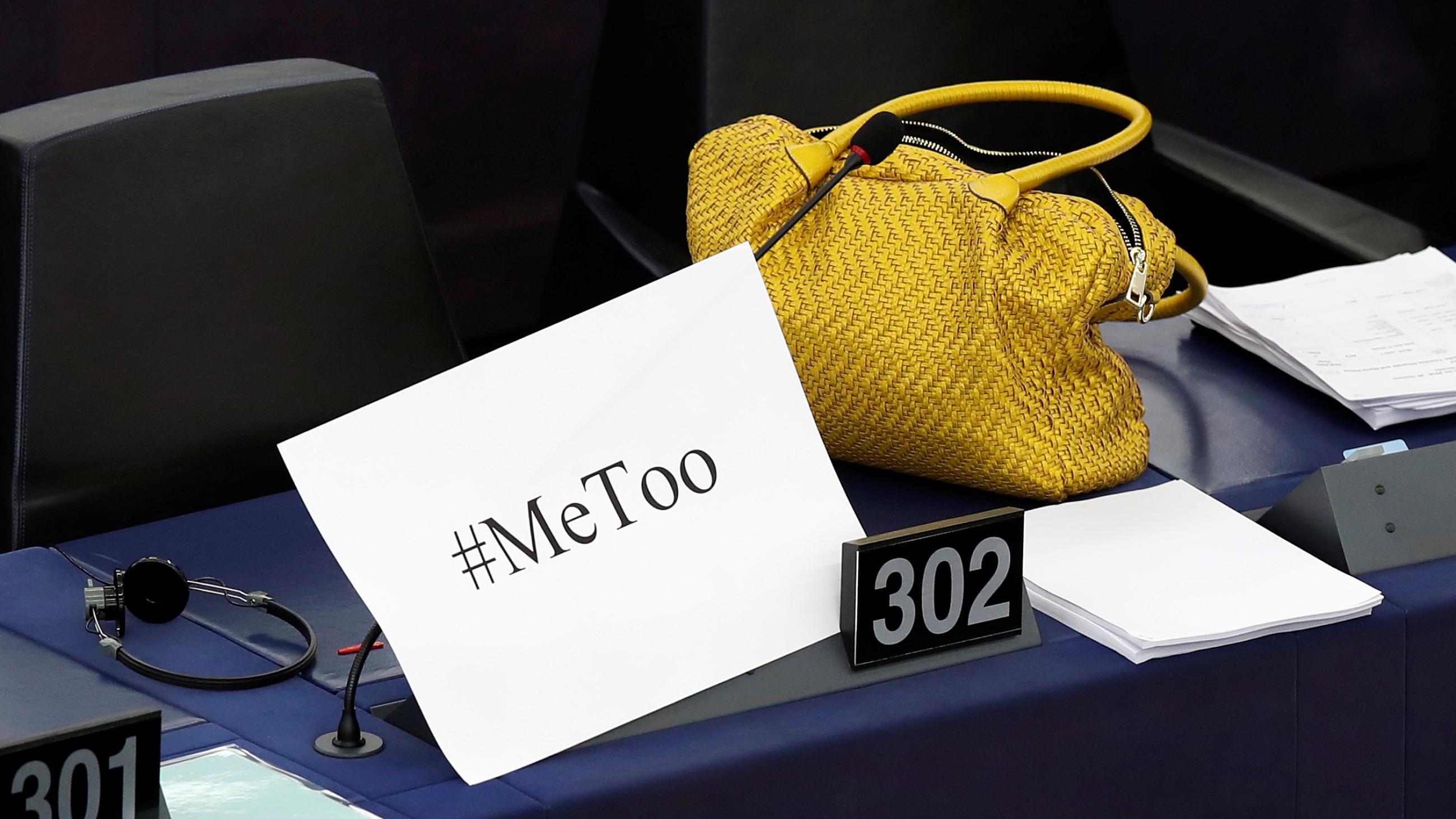 A "MeToo" placard is seen on a European Parliament member's desk during a debate to discuss preventive measures against sexual harassment and abuse at the European Parliament in Strasbourg, France.