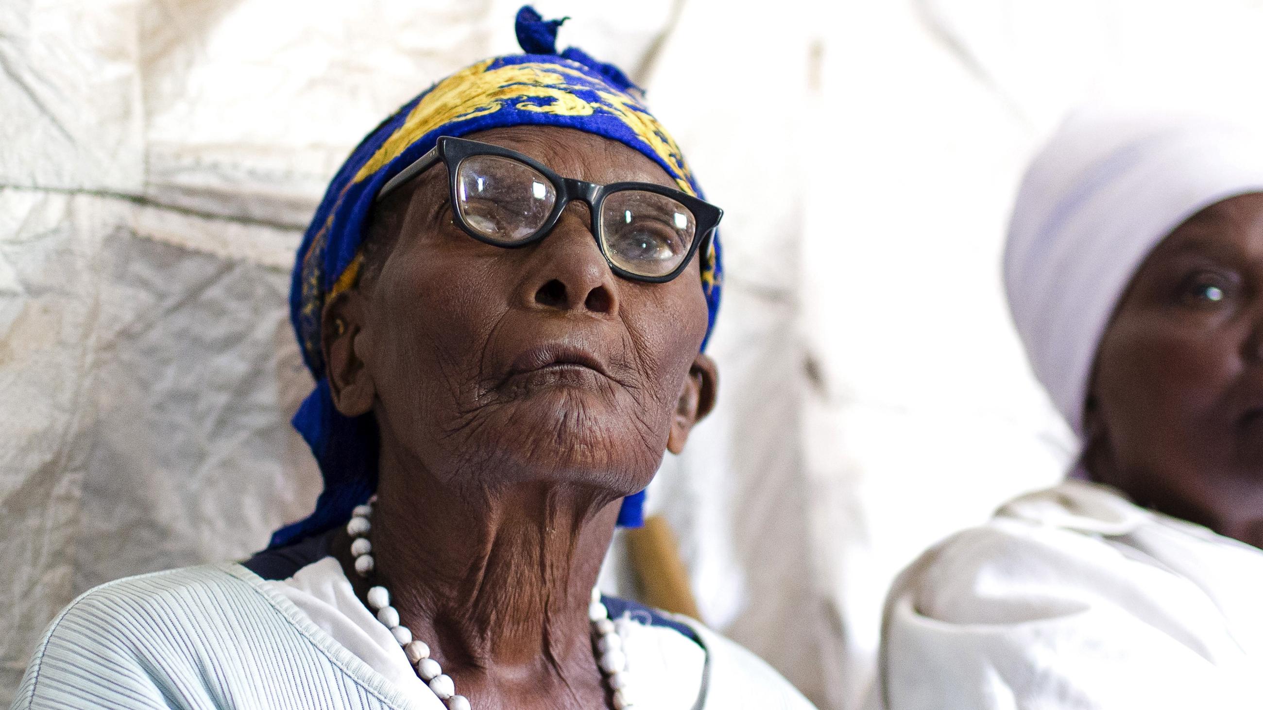 An elderly woman attends a class run by the Ujamaa self-defense program.