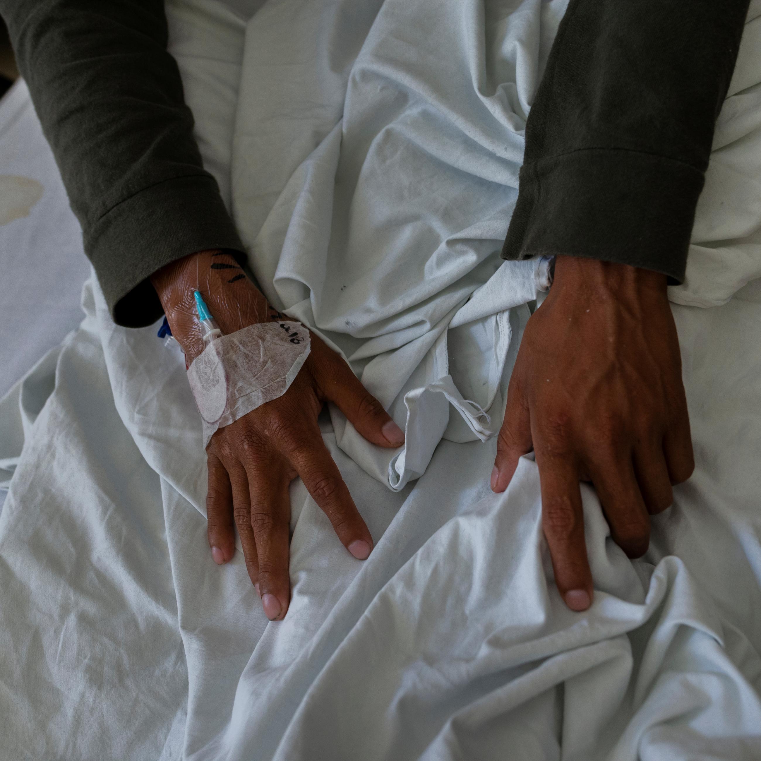 The hands of TB patient Arturo Maldonado, 25, can be seen during his treatment for tuberculosis at the Hospital Muñiz, in Buenos Aires, Argentina, on January 11, 2019. 