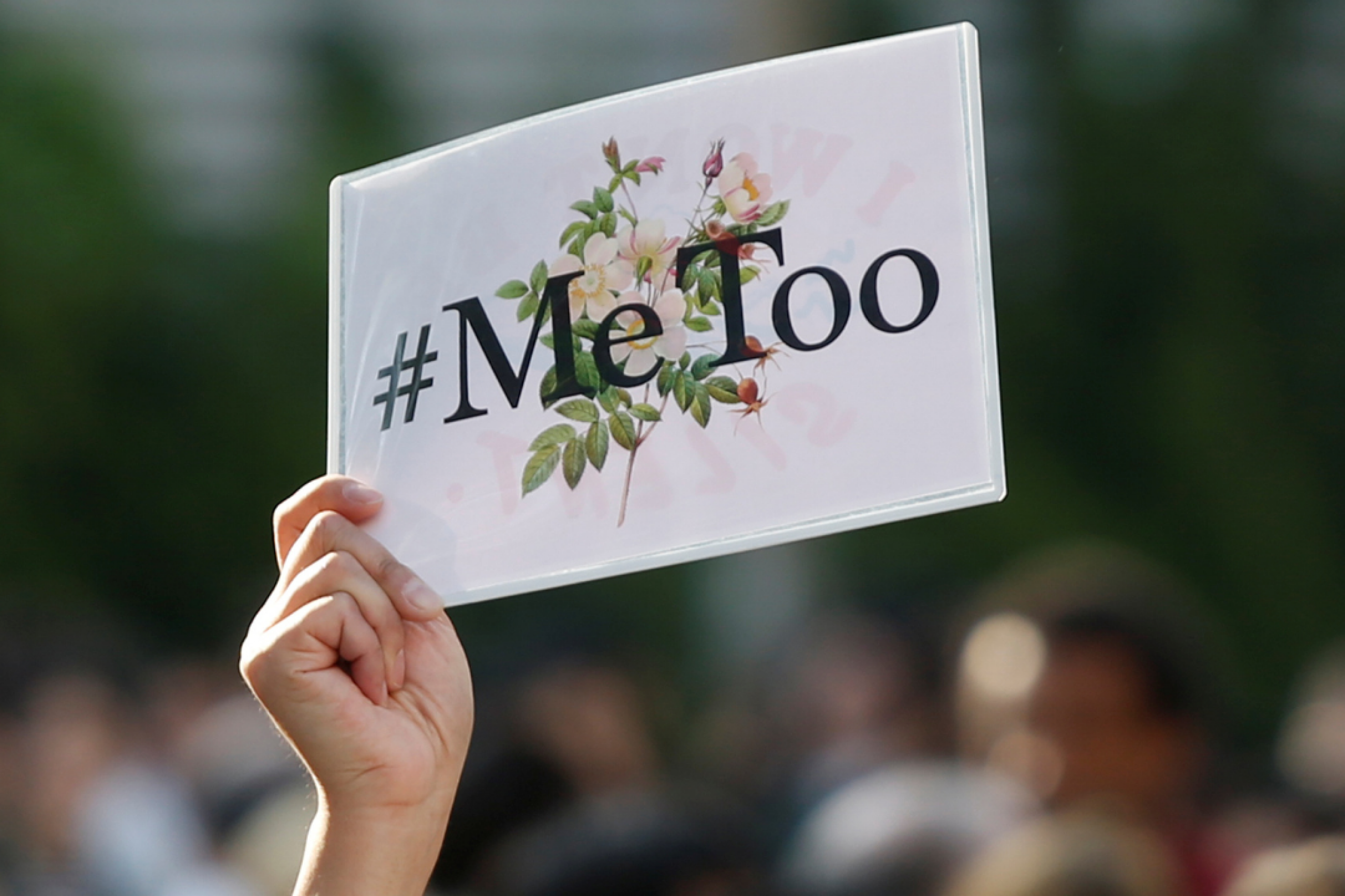 A protester raises a #MeToo sign during a rally against harassment at Shinjuku shopping and amusement district in Tokyo, Japan on April 28, 2018. REUTERS/Issei Kato