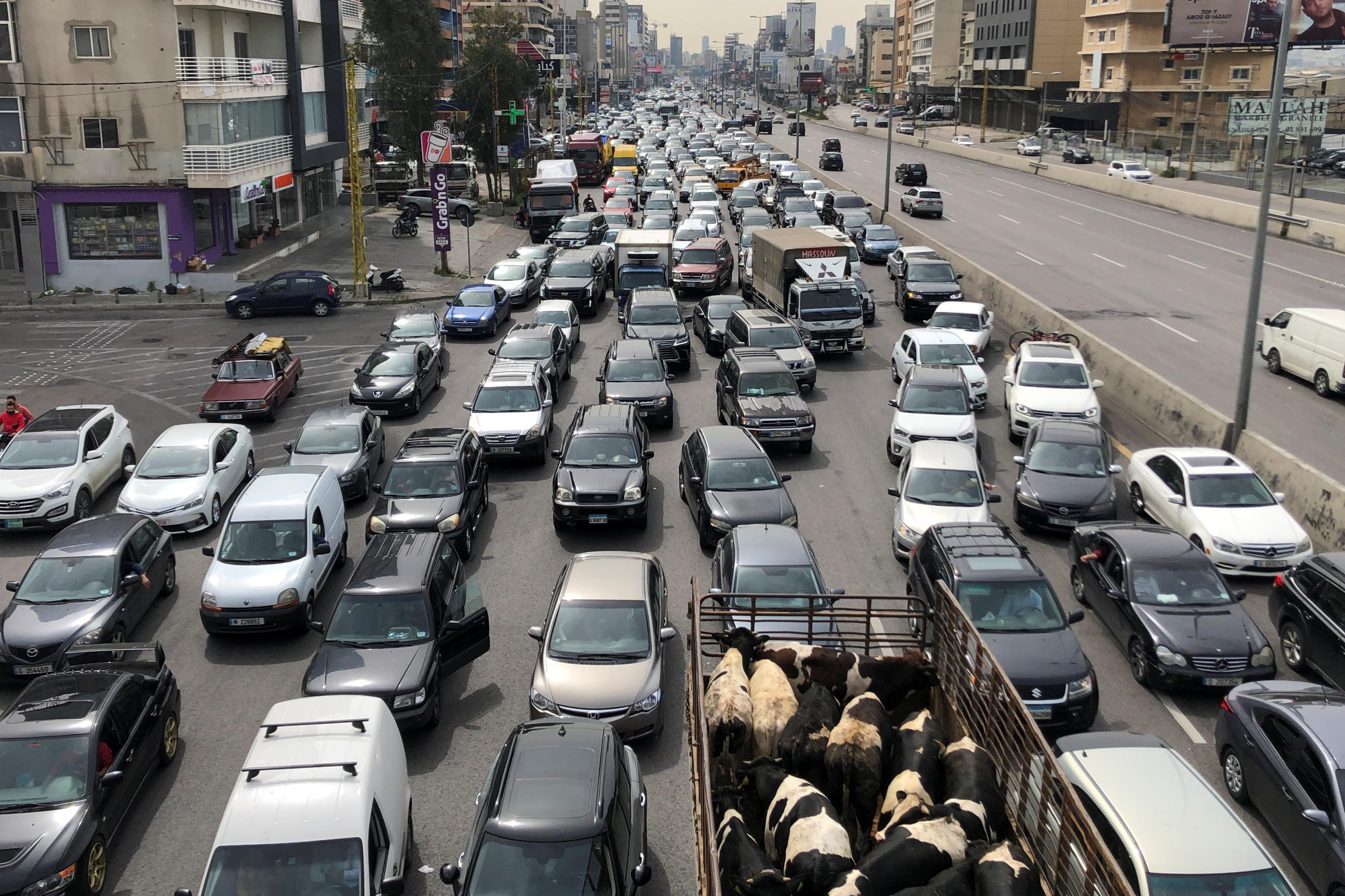 Vehicles are stuck in a traffic jam on a highway, in Jal el-Dib, Lebanon, on March 9, 2021.