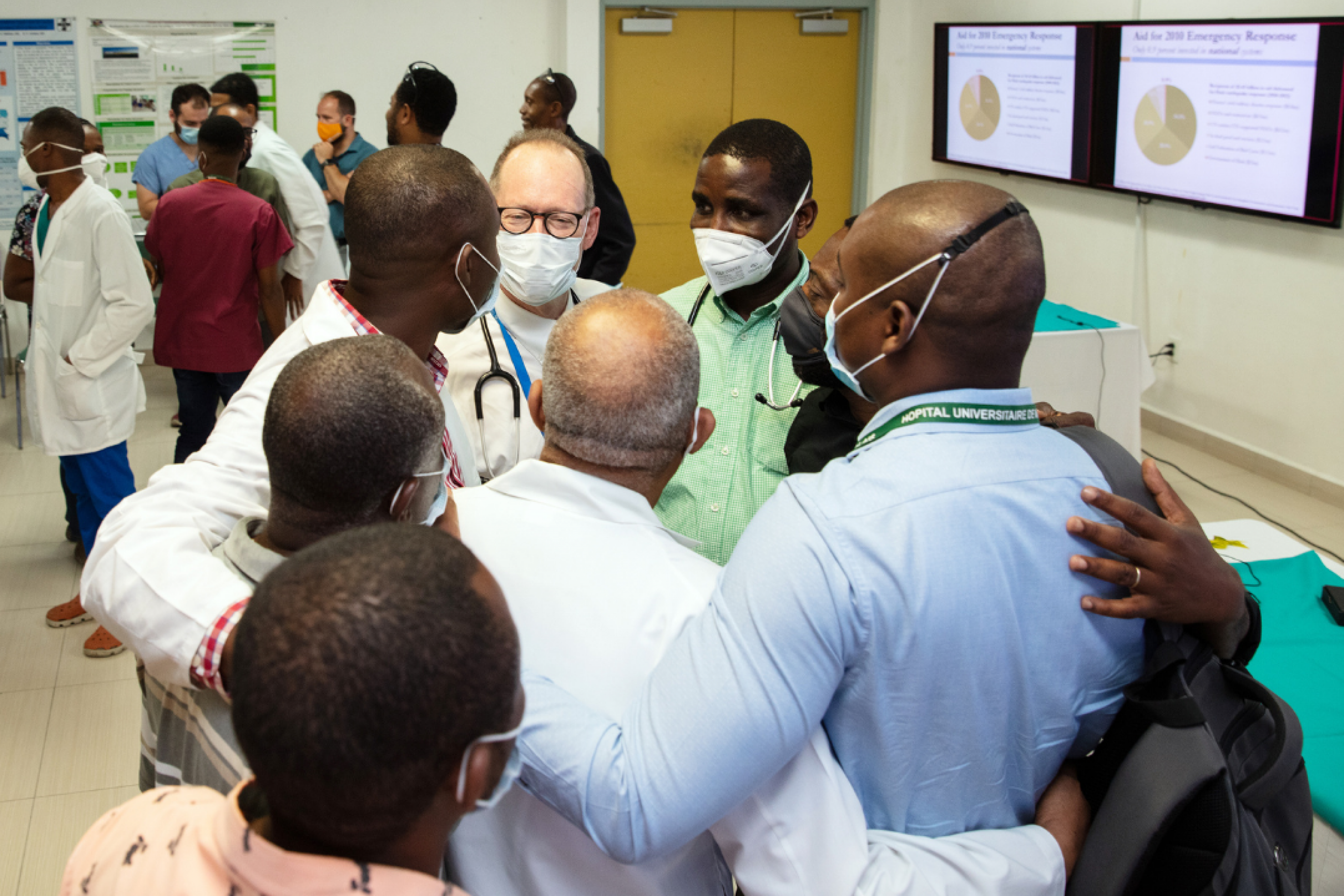 While helping with the response to the Aug. 14, 2021, earthquake, Dr. Paul Farmer gives a lecture on the 2010 Haiti earthquake and speaks with clinicians at Hospital University de Mirebalais.