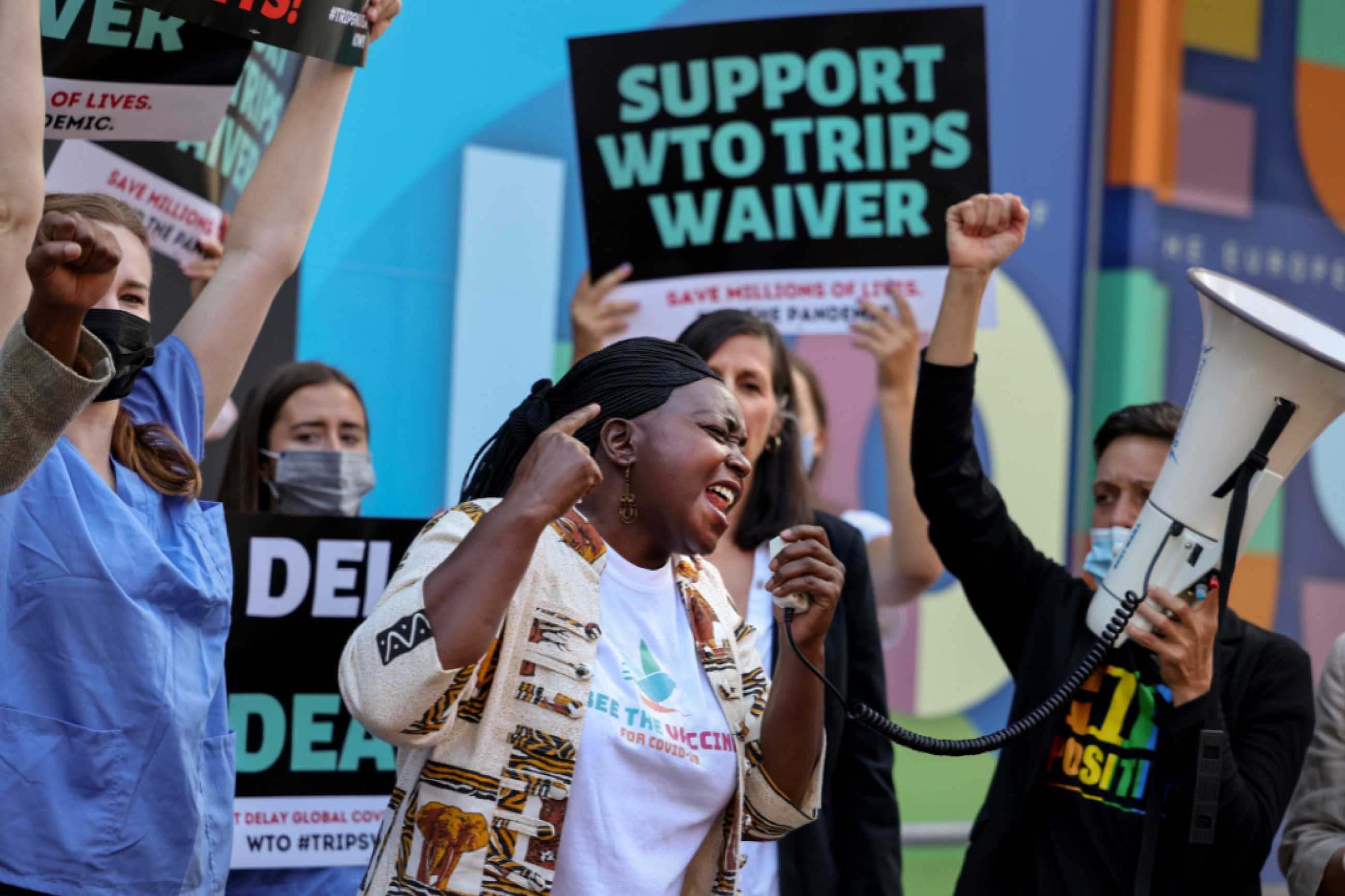 Pauline Muchina, of American Friends Service Committee, and activists call on the EU to end opposition to a COVID-19 waiver of WTO intellectual property barriers, in Washington, DC, June 24, 2021. 